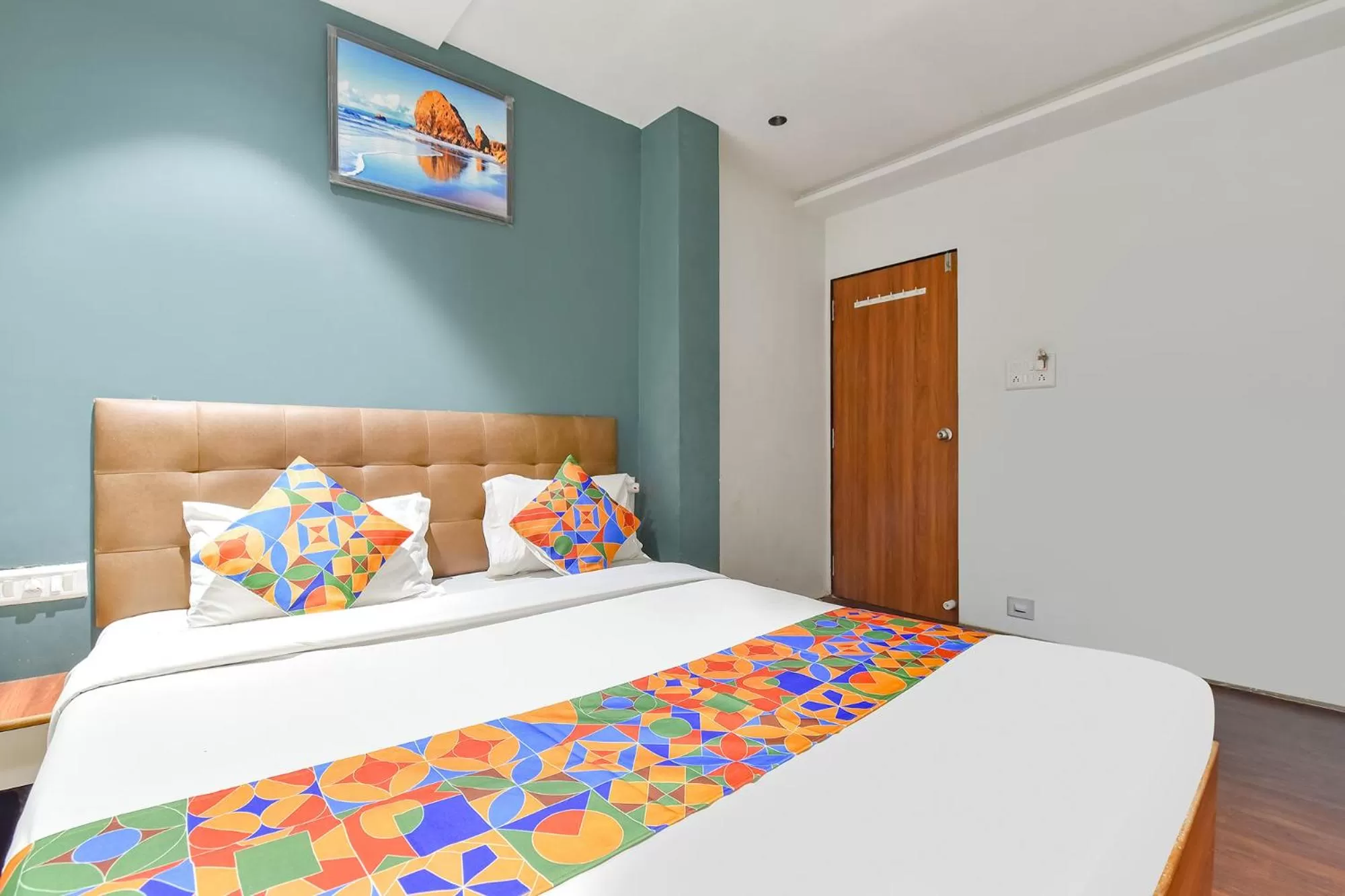 Bed in FabHotel Nidhivan, Udhna Junction