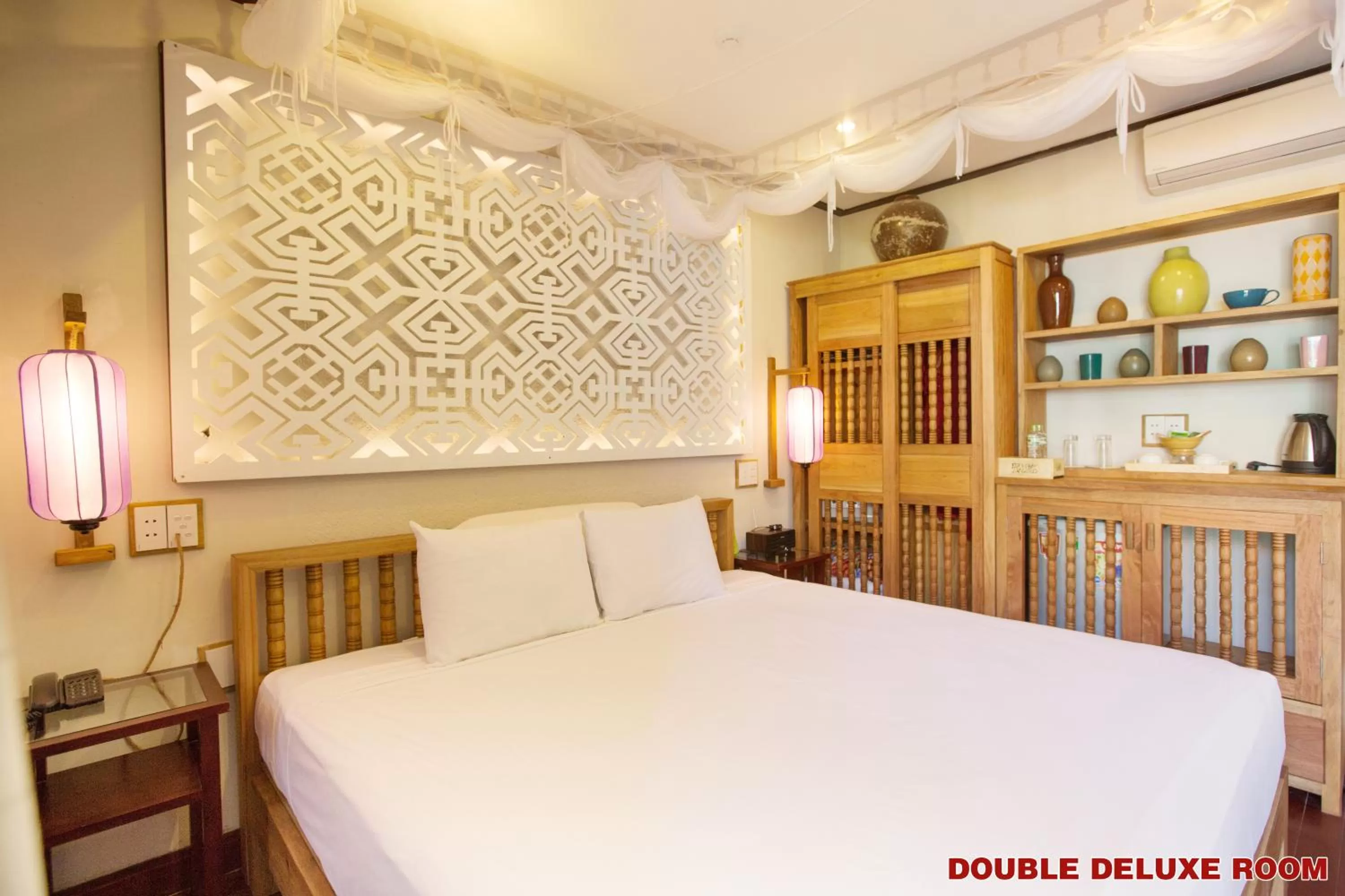 Bed in Hoi An Pho Library Hotel