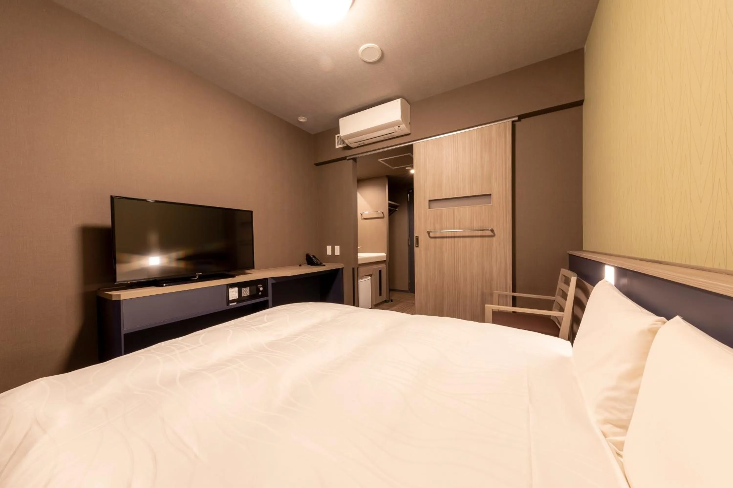 Bed in Dormy Inn Kawasaki Natural Hot Spring