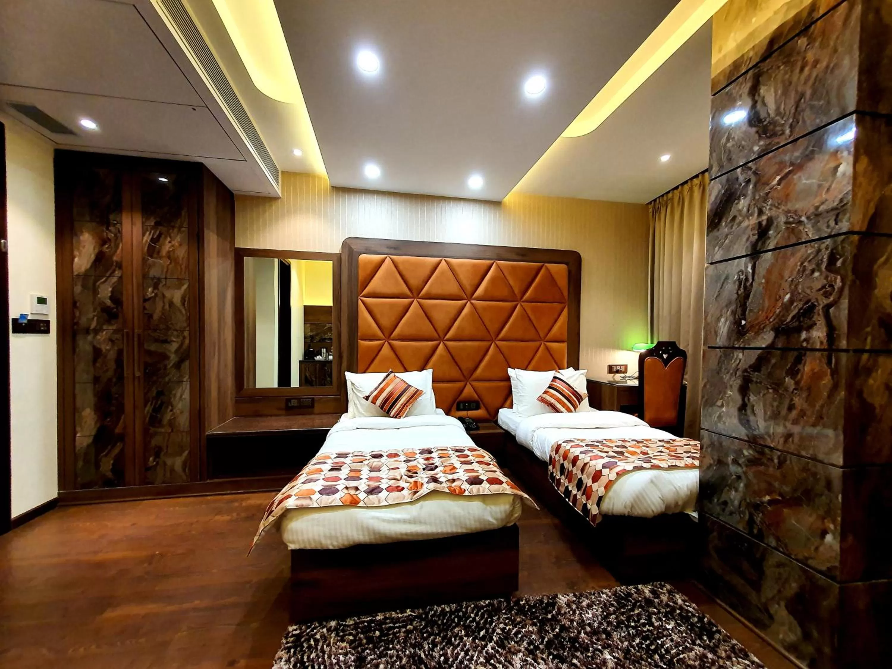 Bed in Hotel Makhan Residency