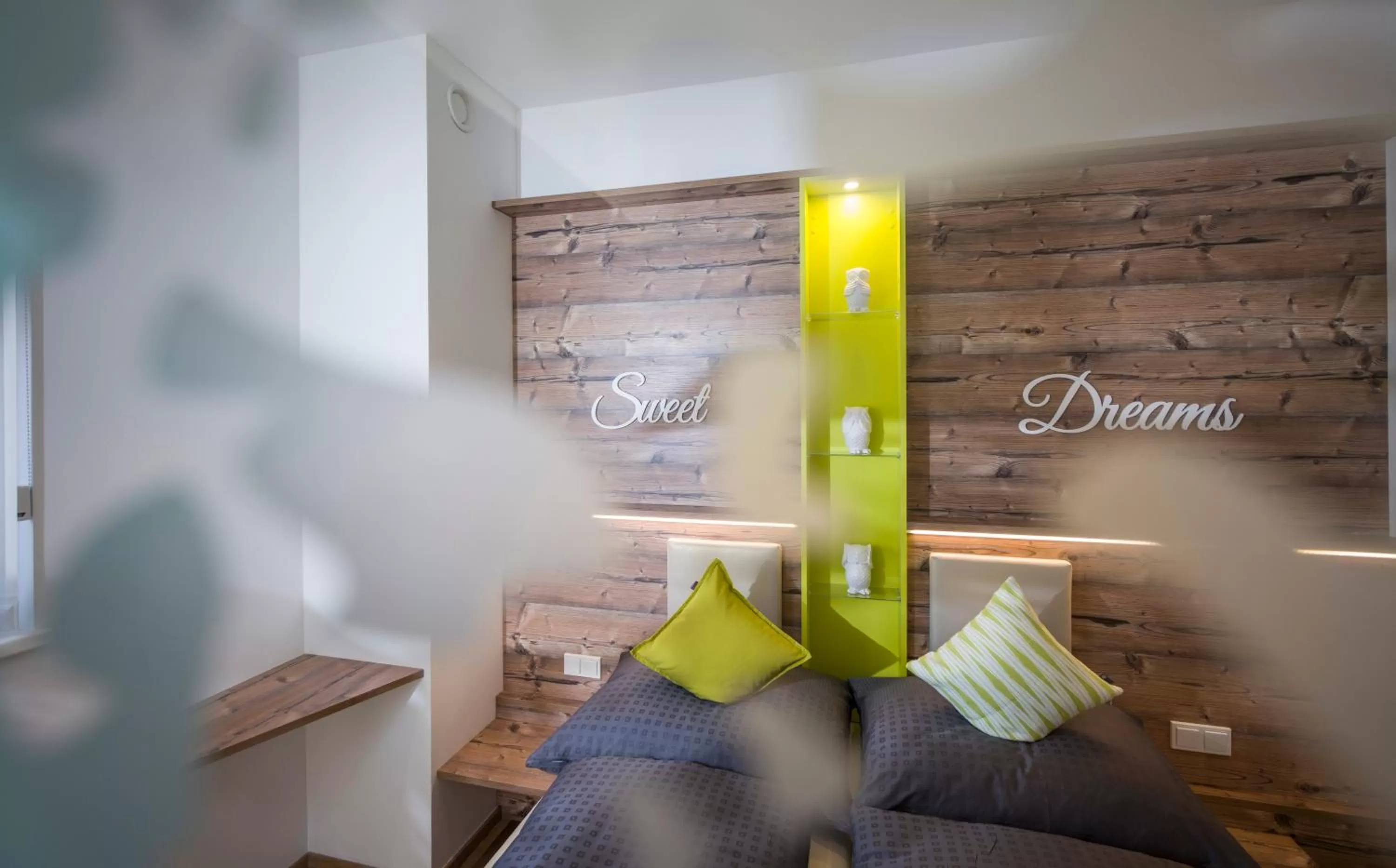 Bedroom, Seating Area in Private Living Apartments