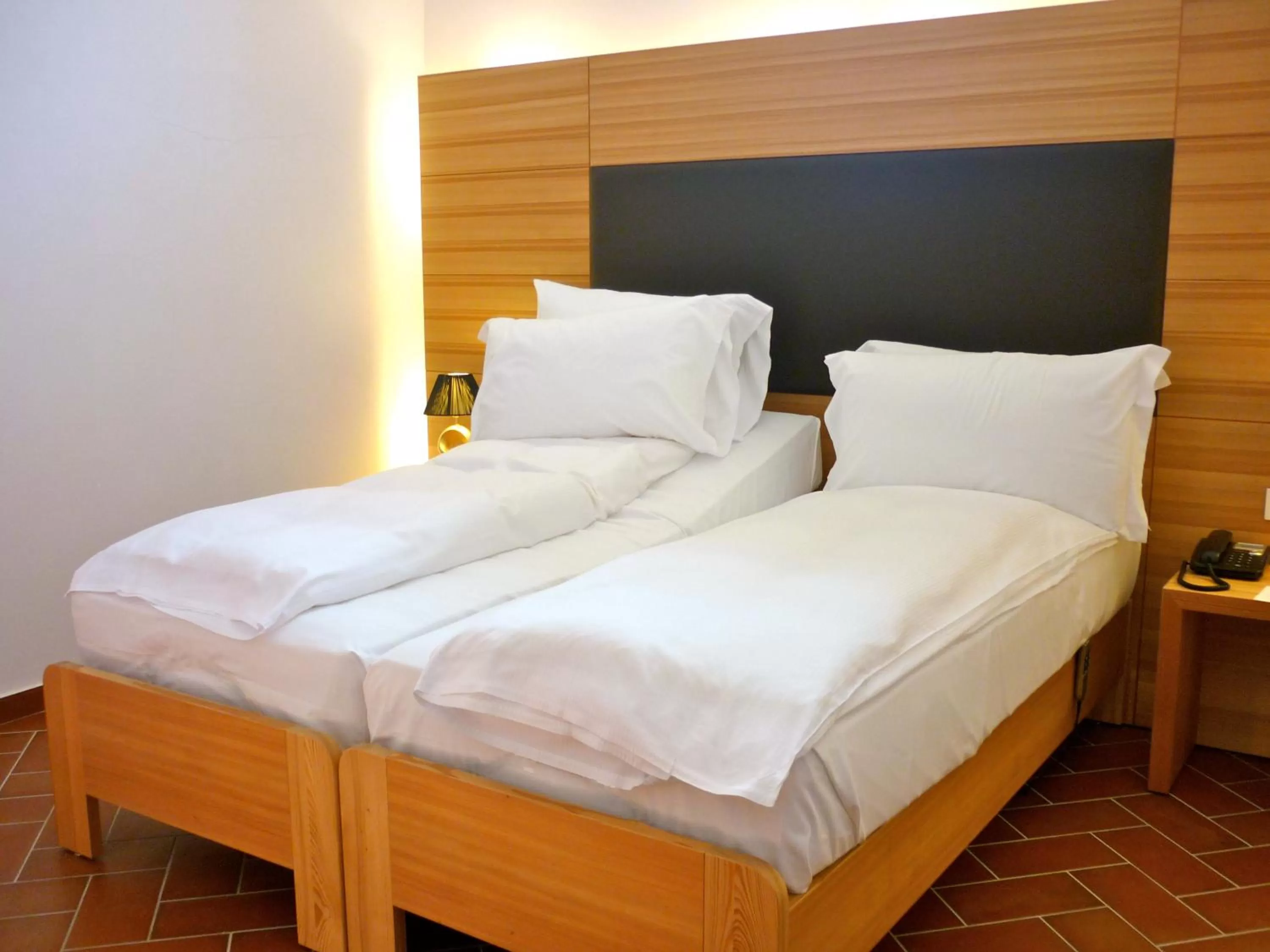 Bed in Relais Palazzo Lodron