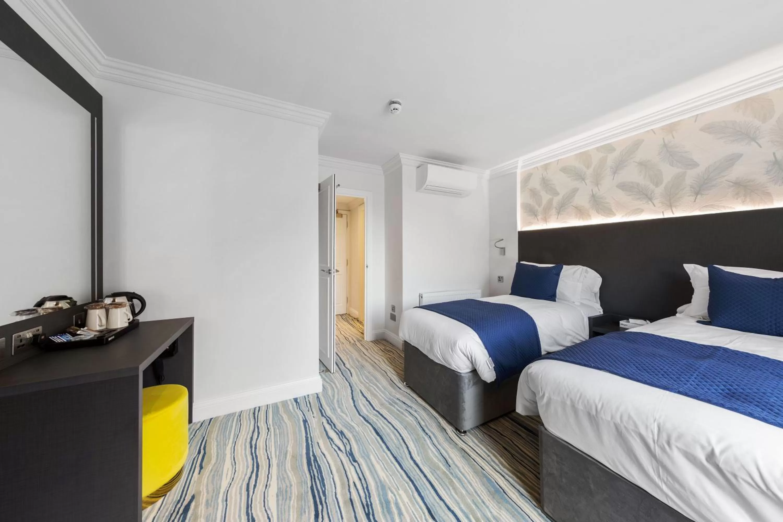 Bed in Commodore Hotel