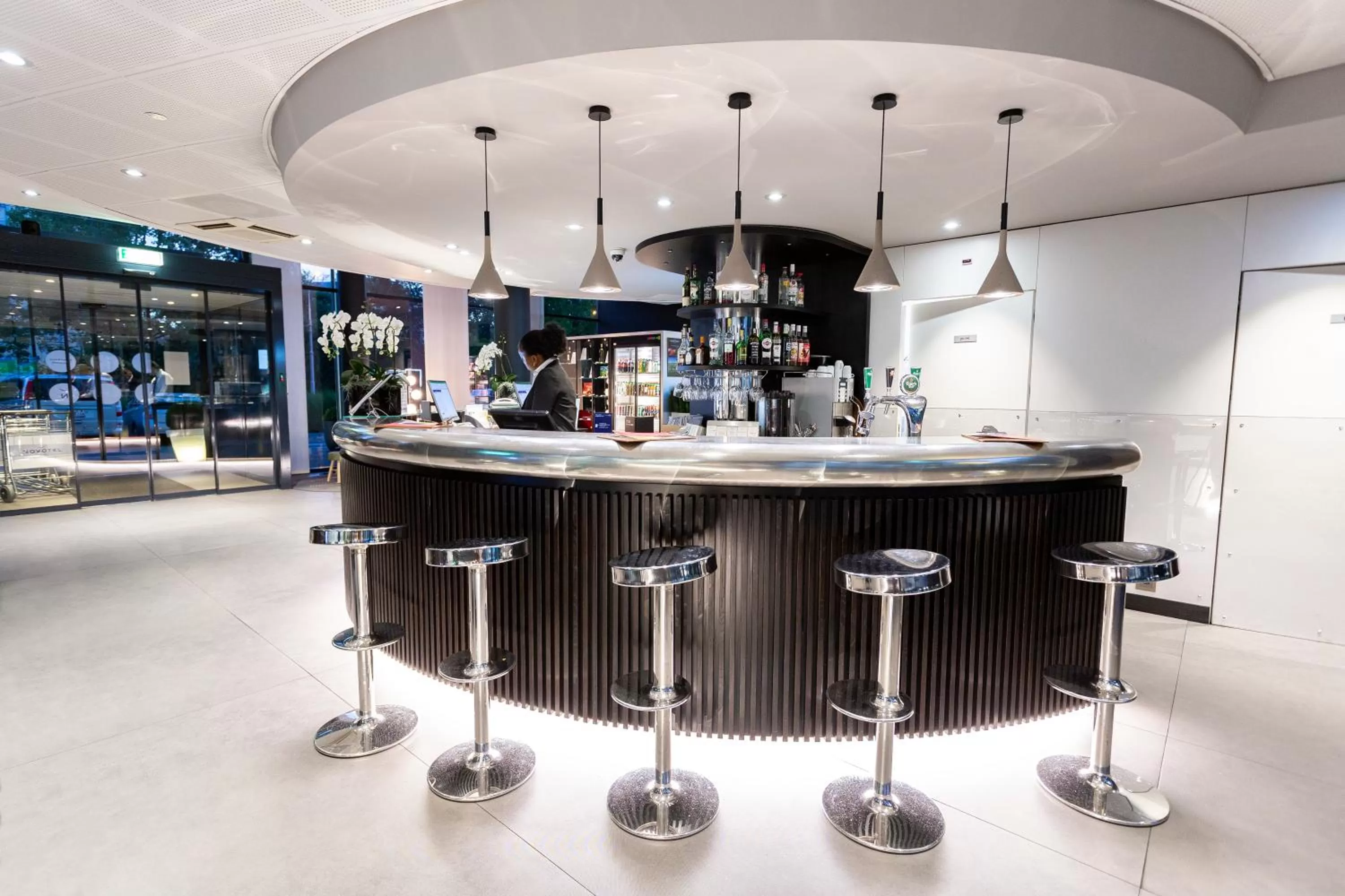 Lounge or bar in Novotel Suites Genève Aéroport