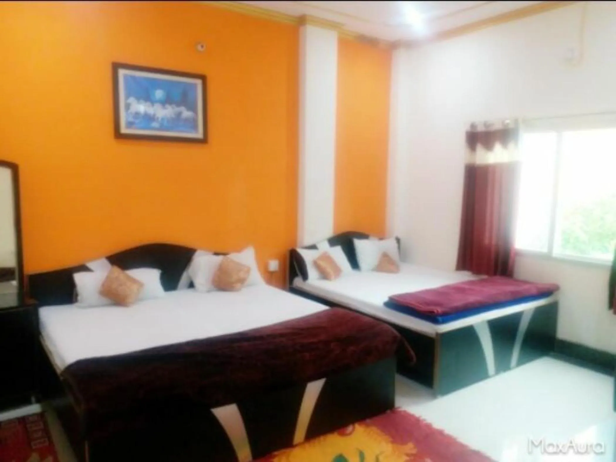 Bed in Goroomgo New Ashiyana Palace Varanasi