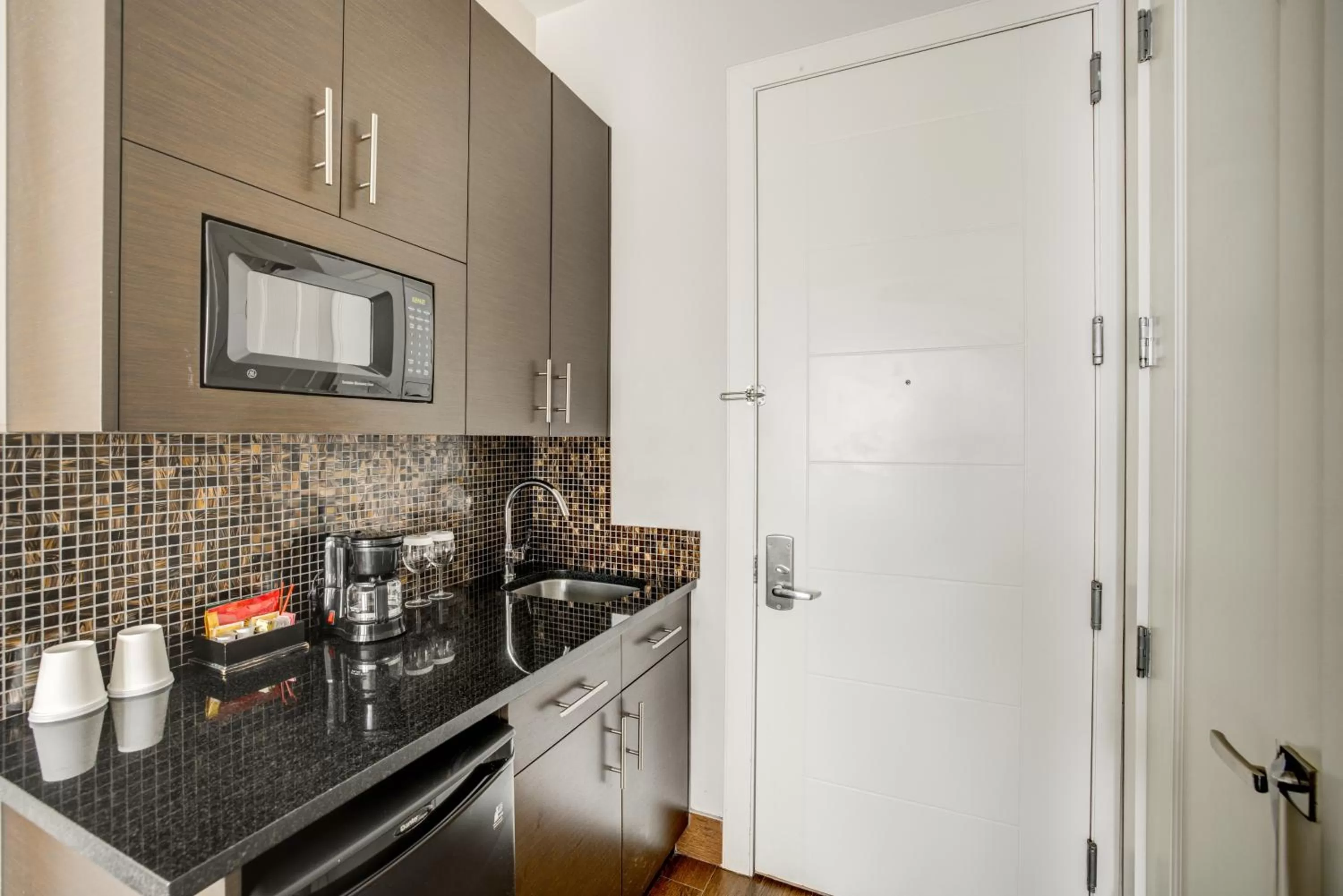 Kitchen or kitchenette in Aura Hotel Brooklyn