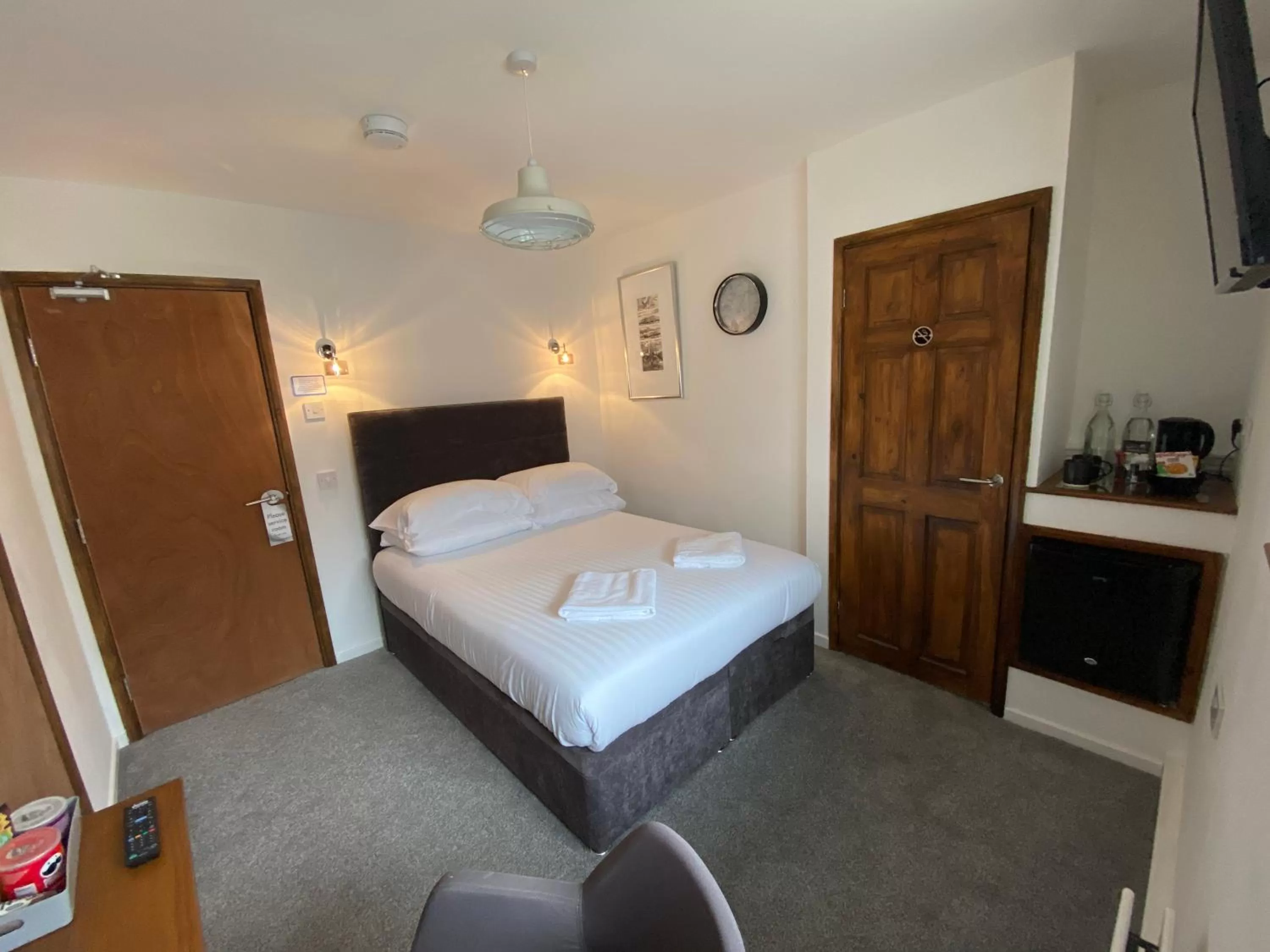 Bed in The Crossroads Inn