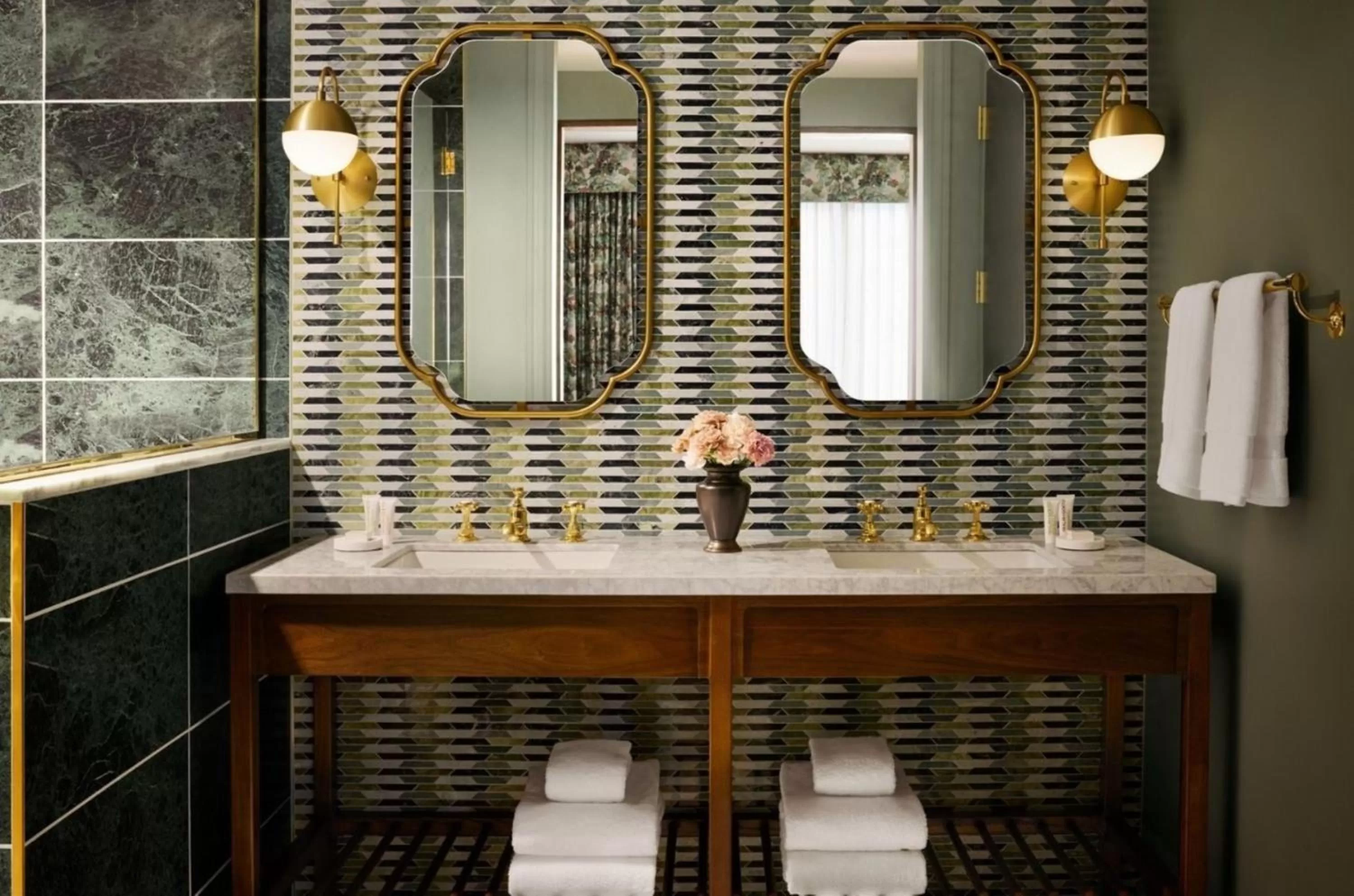 Bathroom in Graduate by Hilton East Lansing