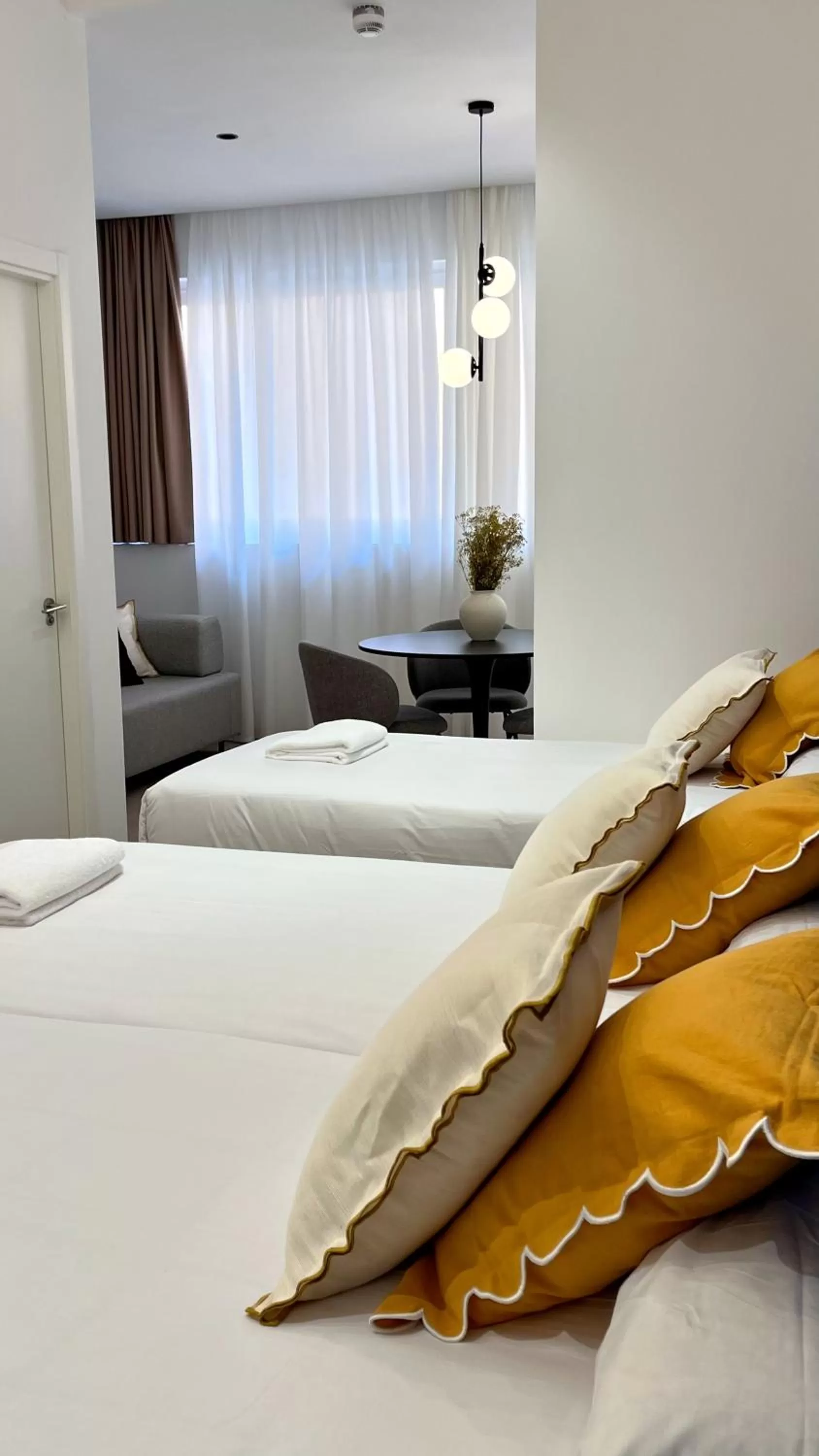 Bed in Blanq Marina Suites