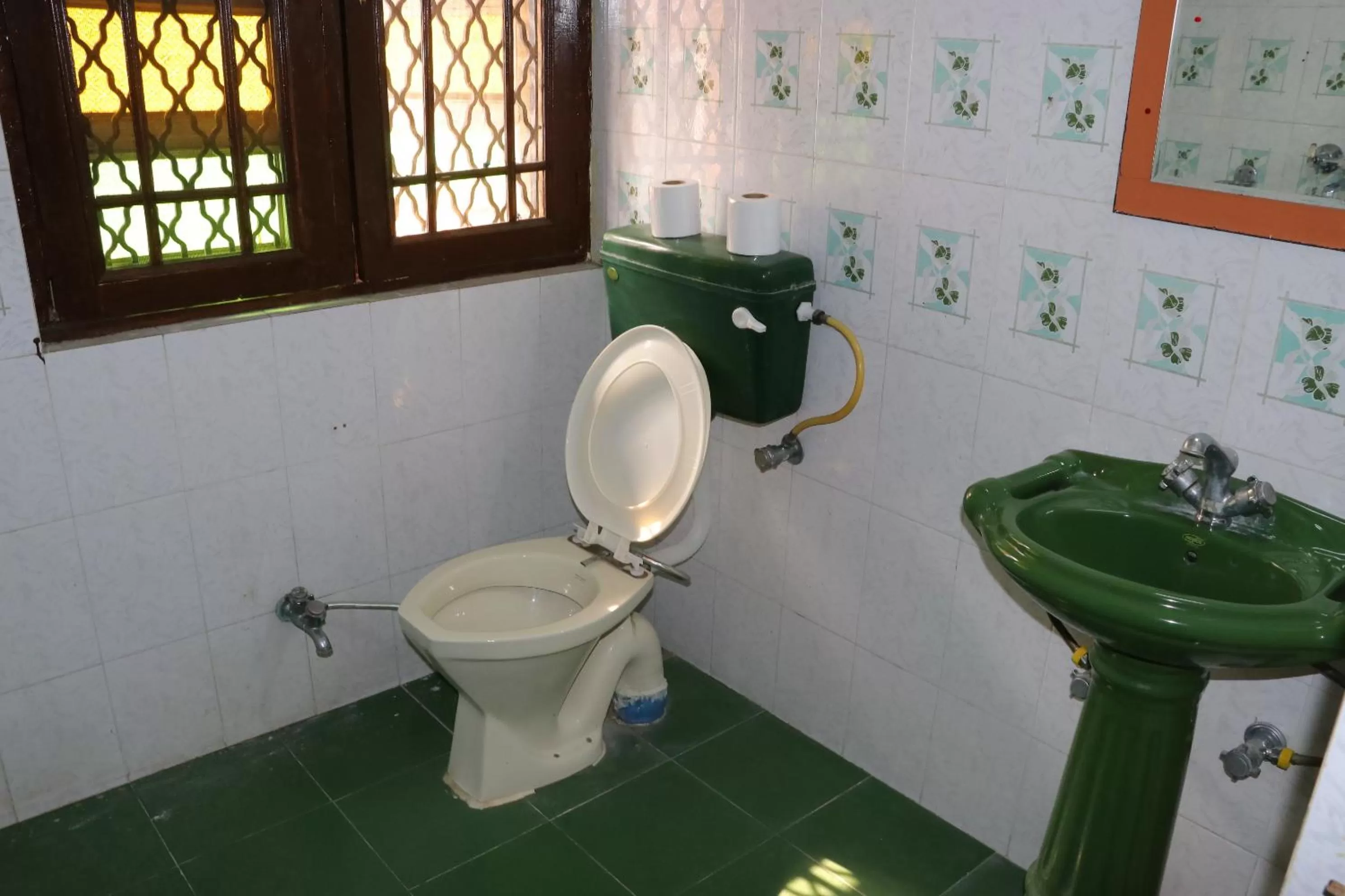 Toilet, Bathroom in The Maurvi Inn