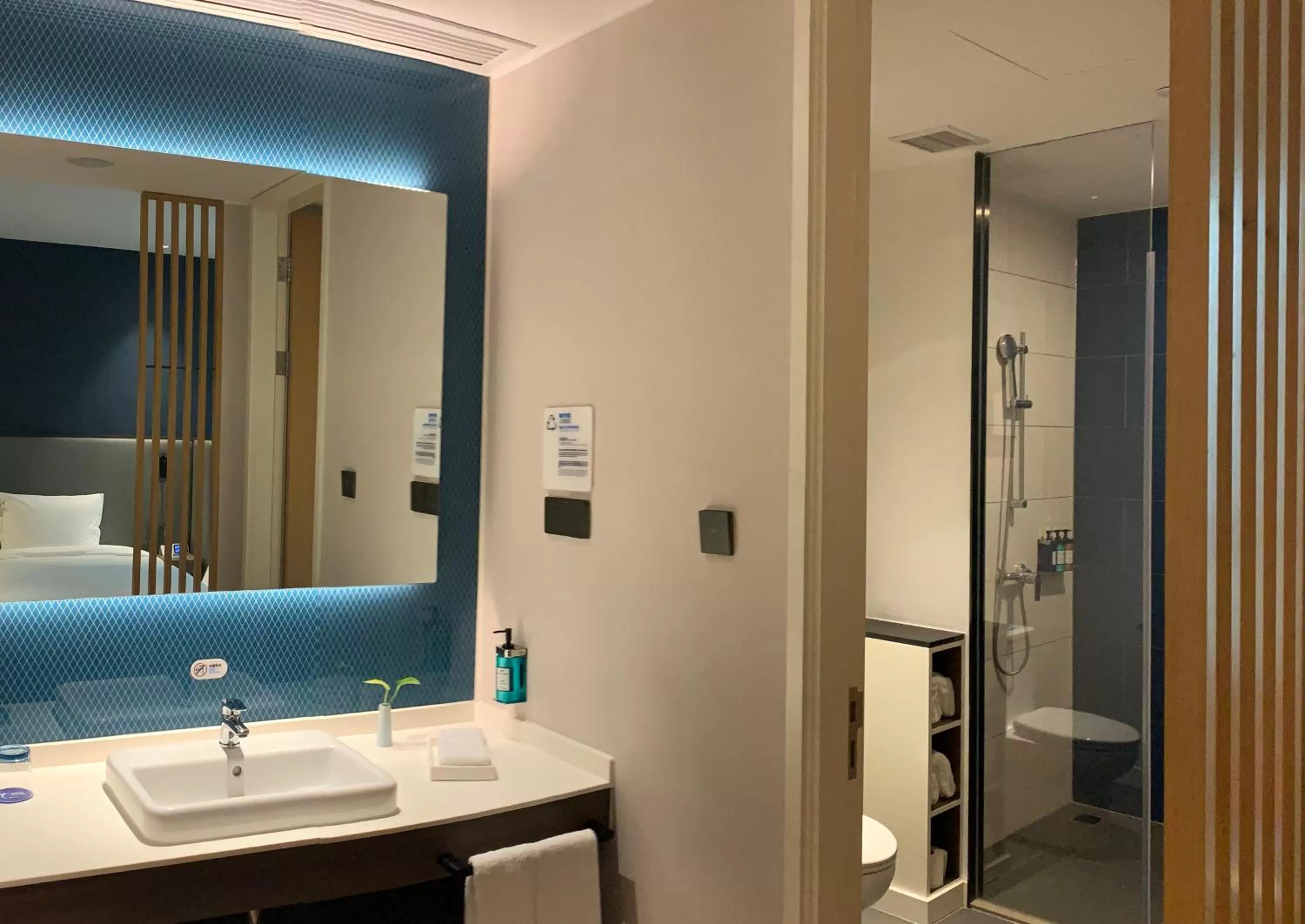 Bathroom in Holiday Inn Express Shanghai Kangqiao by IHG