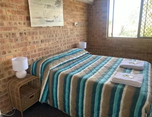 Bed in Golden Beach Motor Inn, Caloundra
