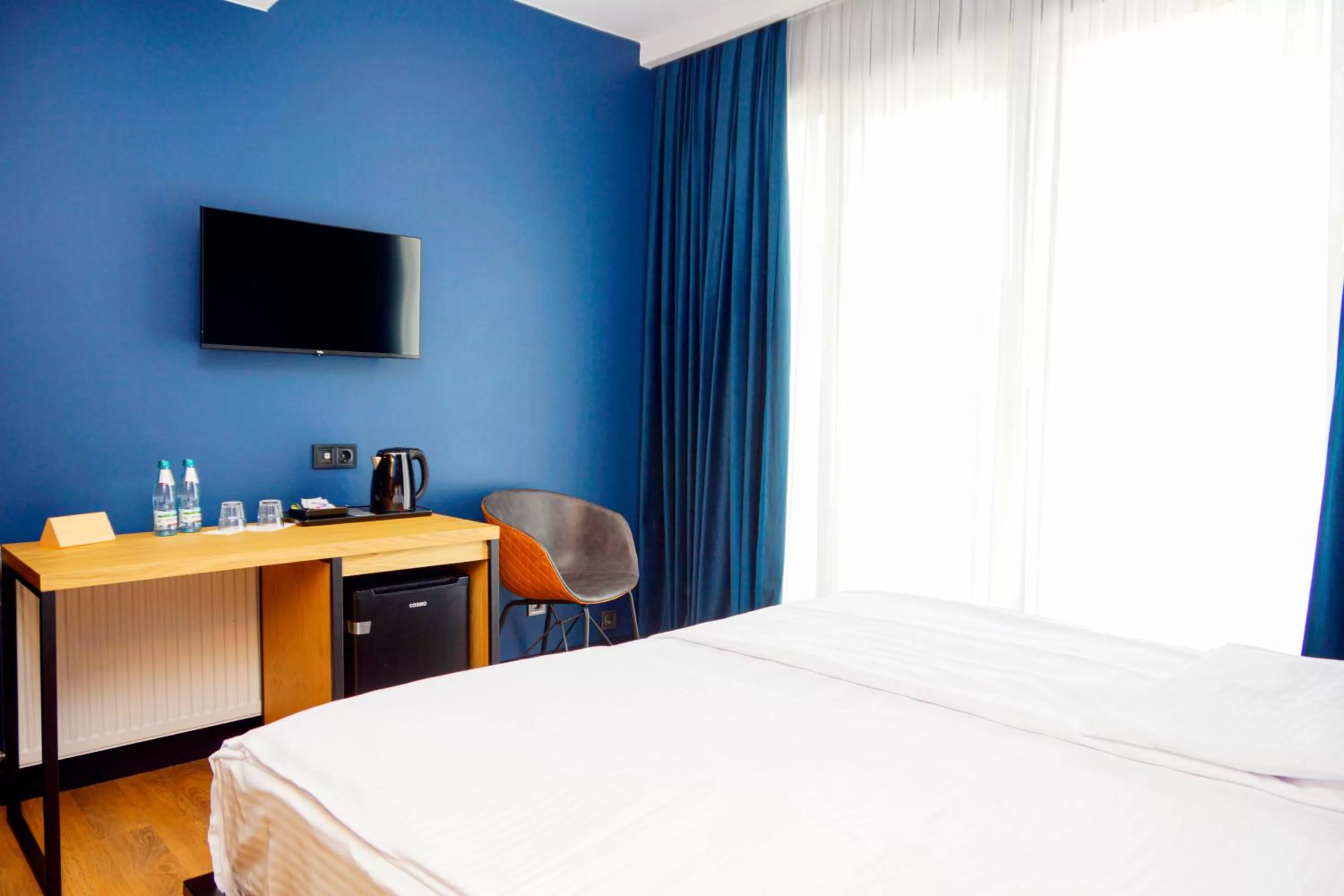 Communal lounge/ TV room, Bed in Borjomi Bridge Hotel