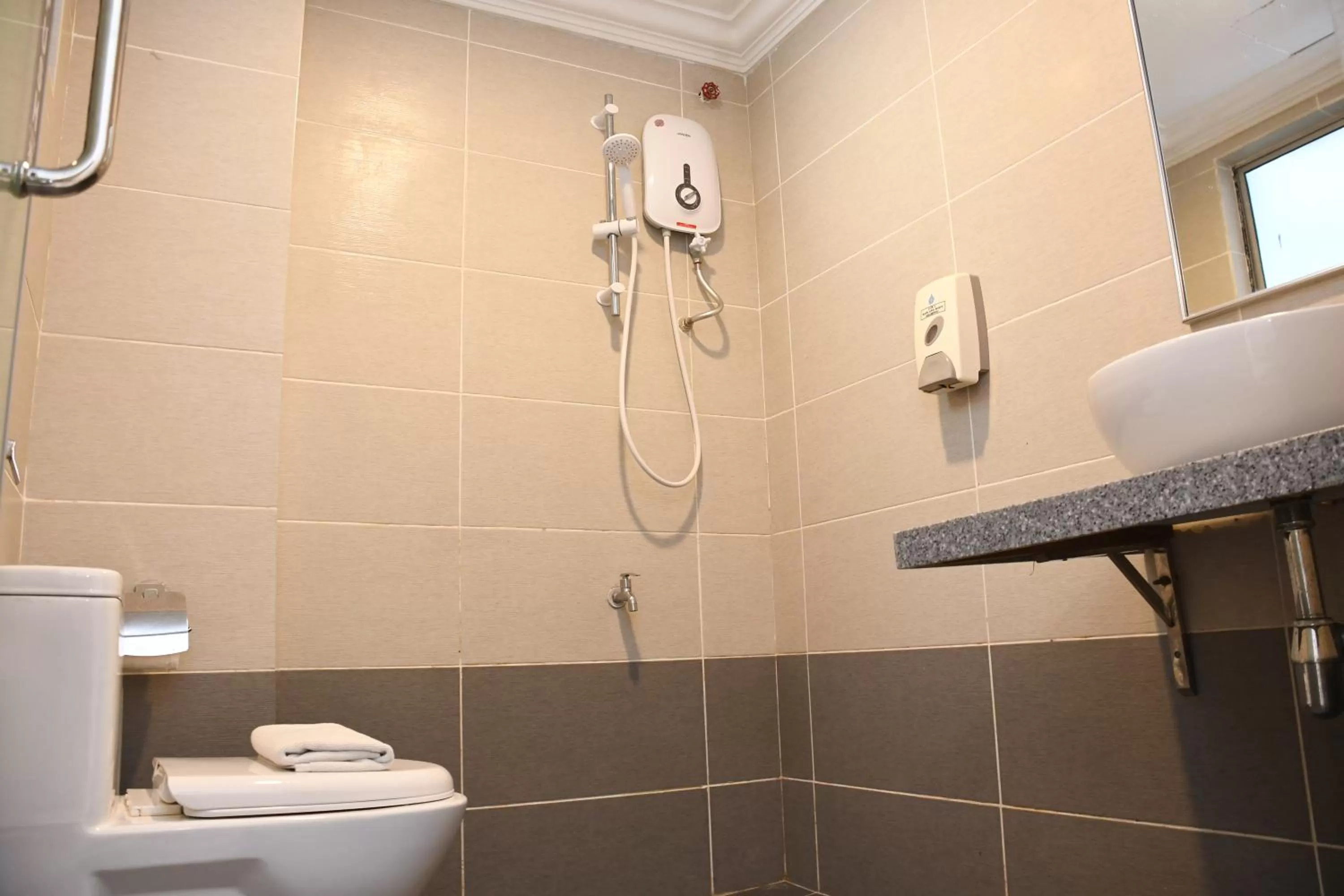 Shower in Promenade Service Apartment