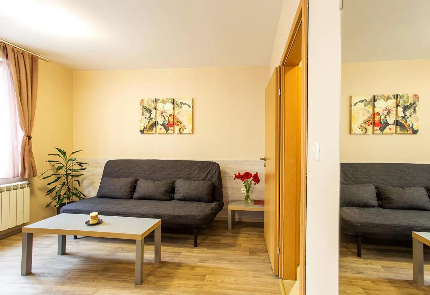 Seating area in Sofia Place Hotel by HMG