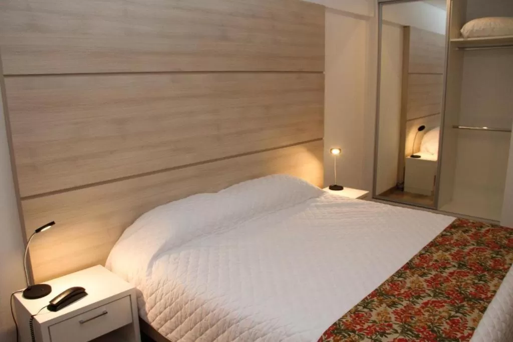 Bed in M Tower Hotel