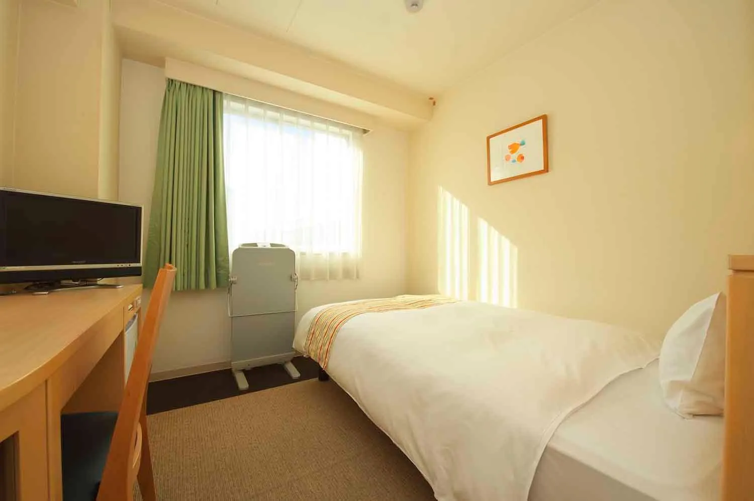 Bed in Chisun Hotel Hiroshima