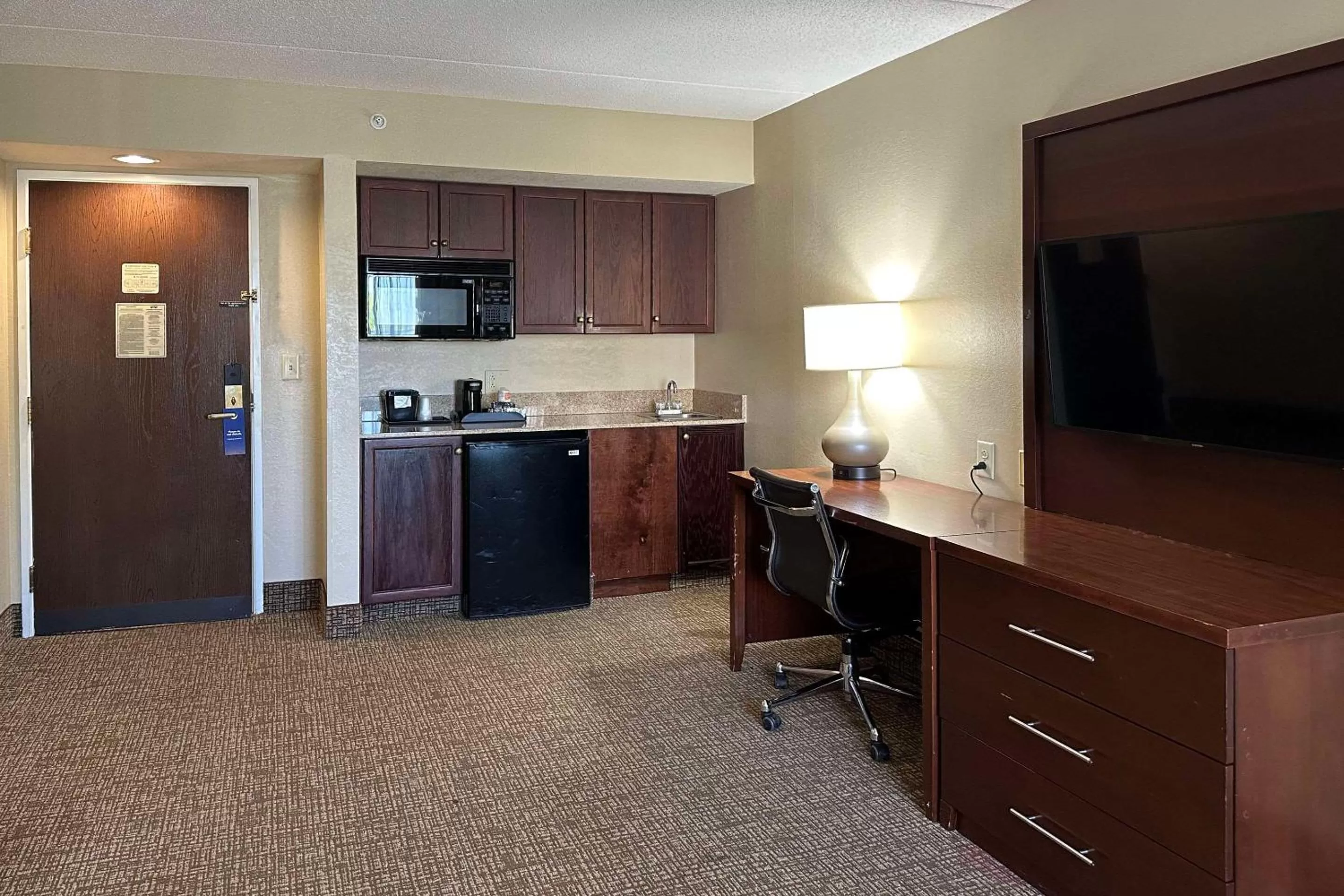 Bedroom in Charlotte Suites by IHG