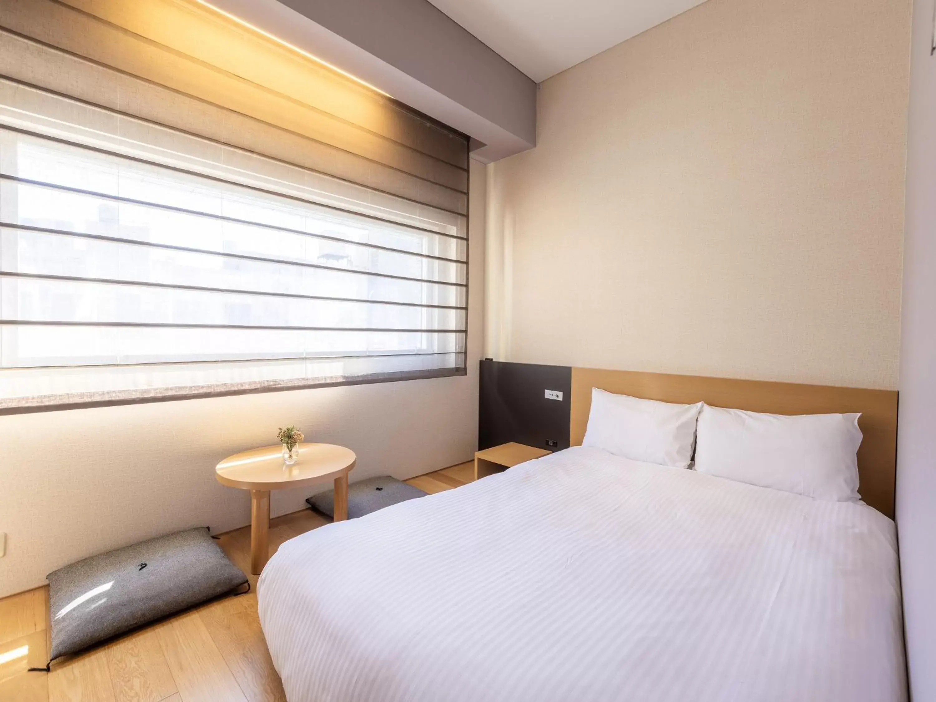 Japanese style double room with small double bed on wooden floor - single occupancy - Non-Smoking in Hotel Gracery Ginza Japanese style double room with small double bed on wooden floor - single occupancy - Non-Smoking in Hotel Gracery Ginza