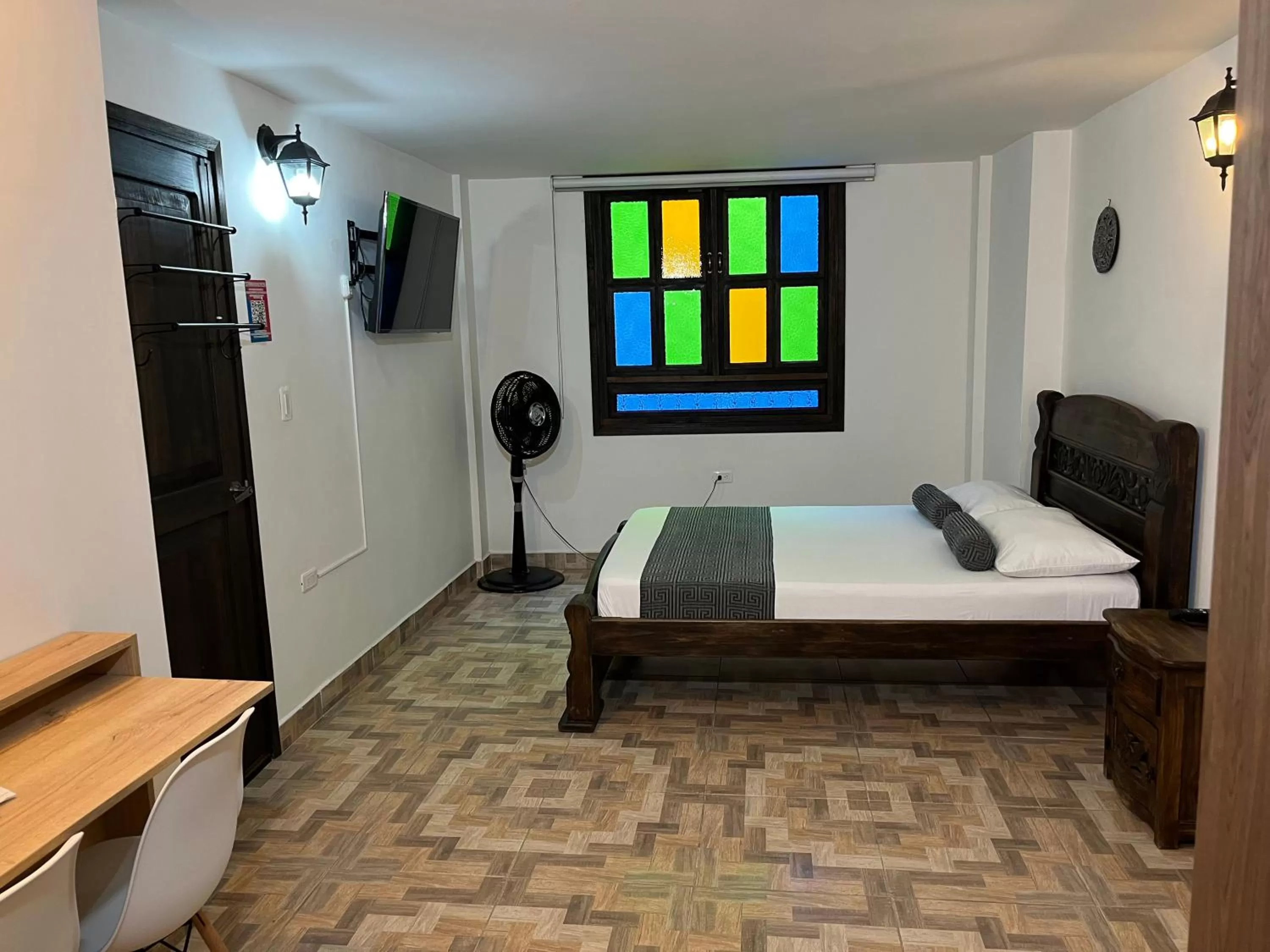 Photo of the whole room, Bed in Santiago DC Hotel