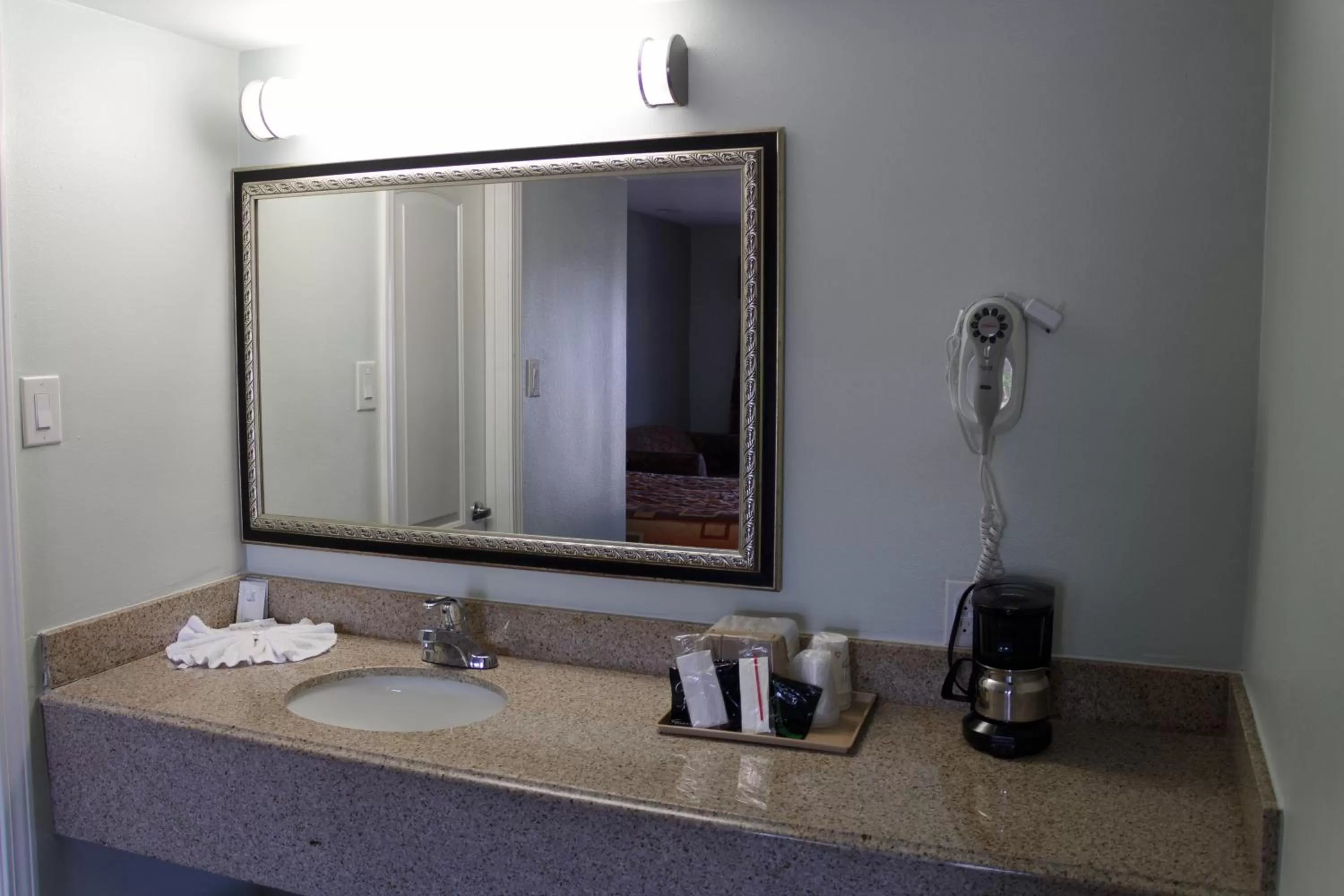 Bathroom in Continental Inn and Suites Nacogdoches TX SFA University Downtown