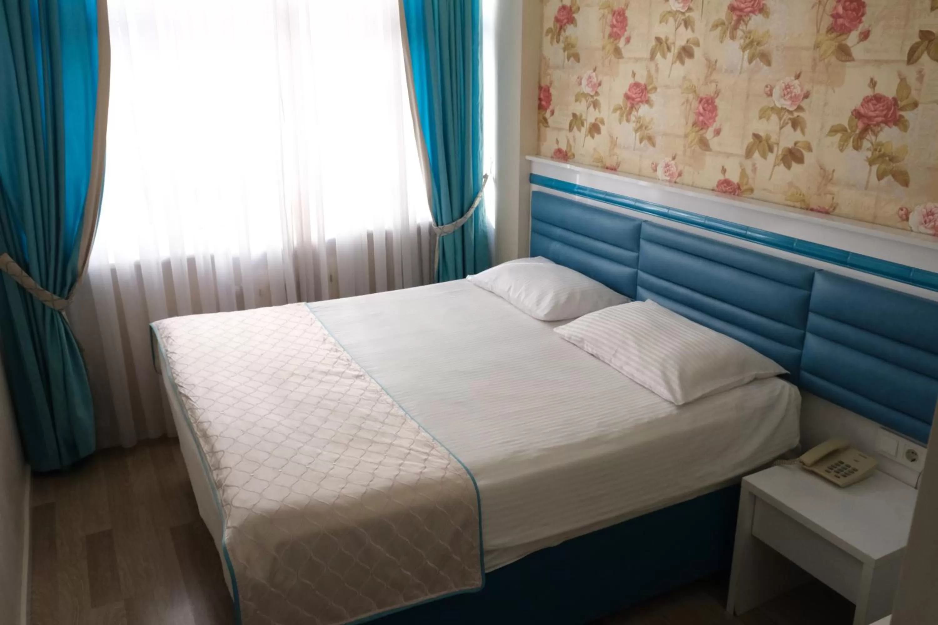 Bed in Star Holiday Hotel