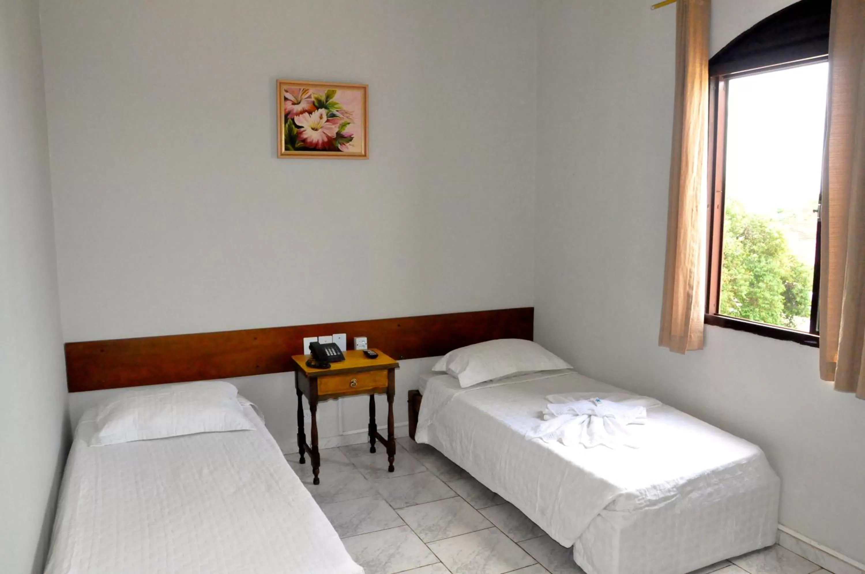 Bed in Hotel Caçula