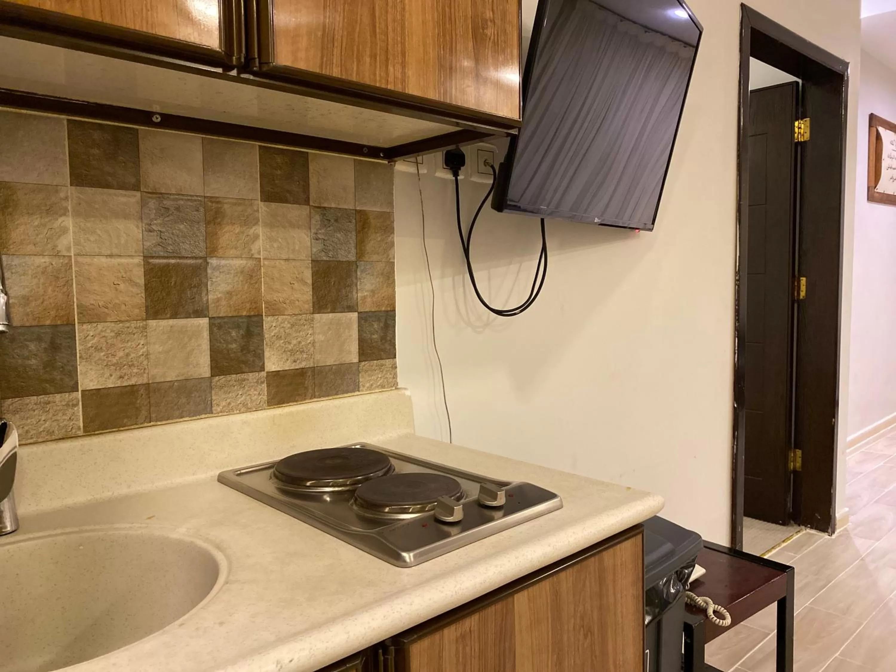 Kitchen or kitchenette in شقق ارين البساتين