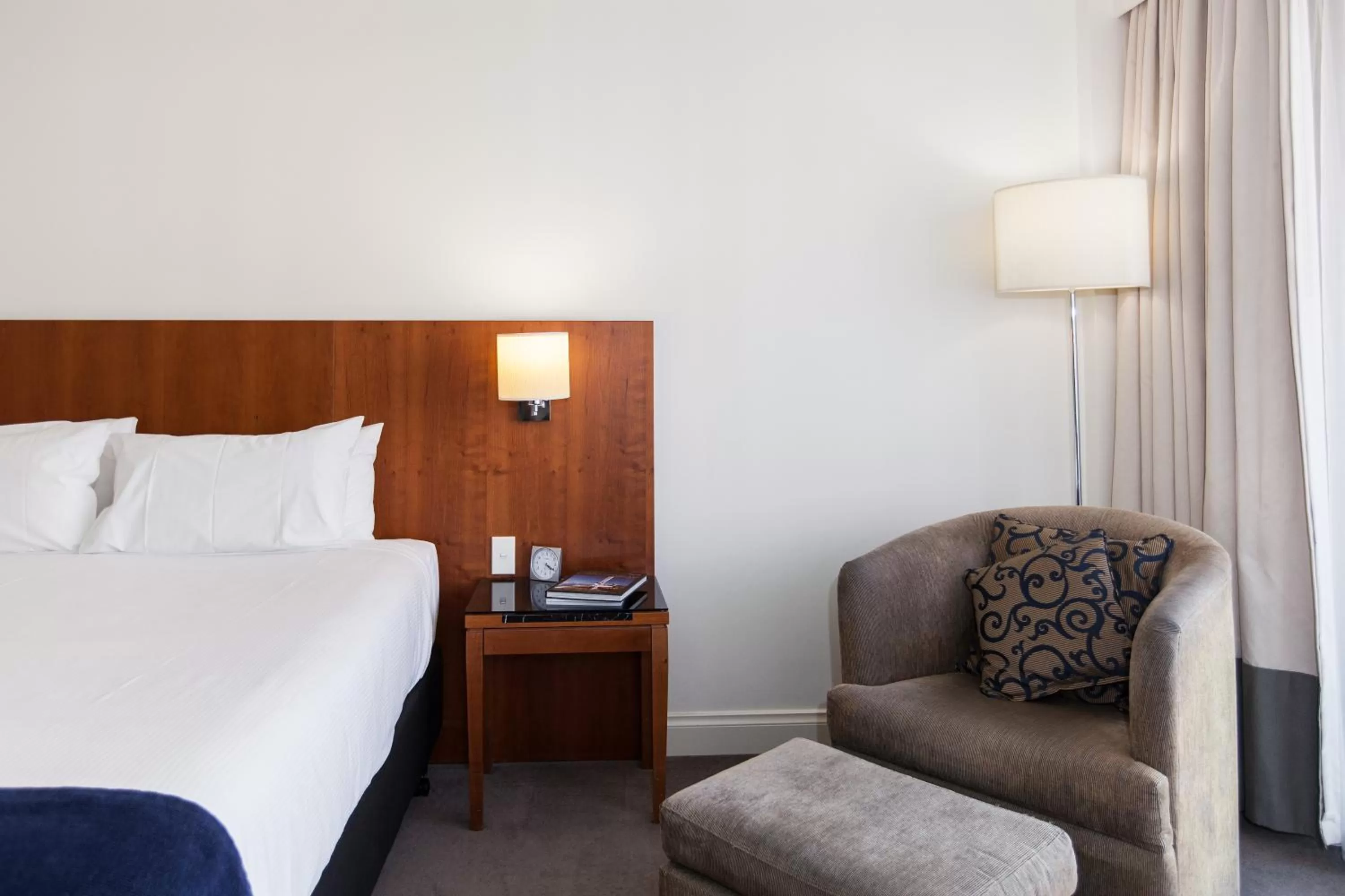 Bed in Majestic Roof Garden Hotel