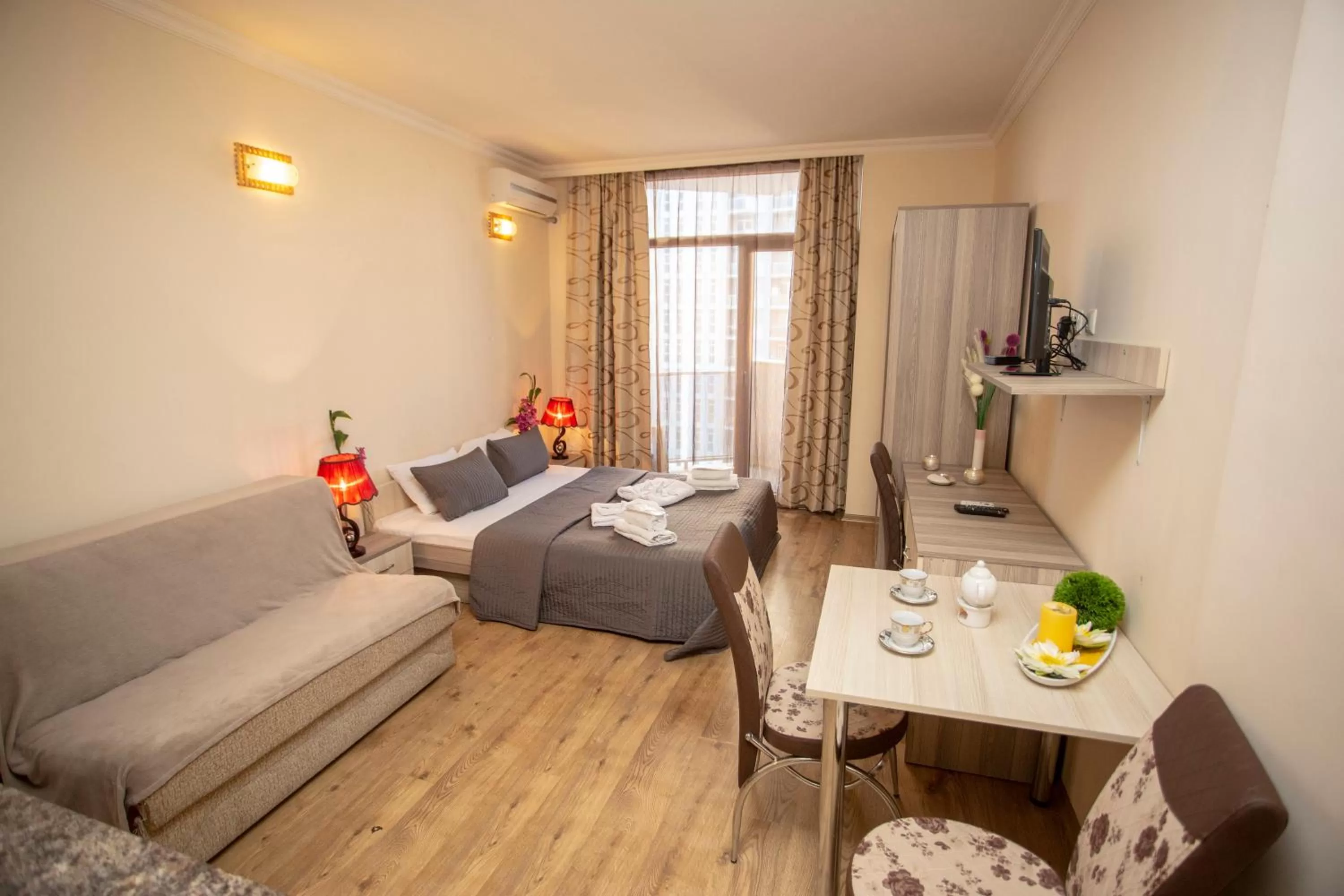 Living room, Bed in Blue Star Batumi