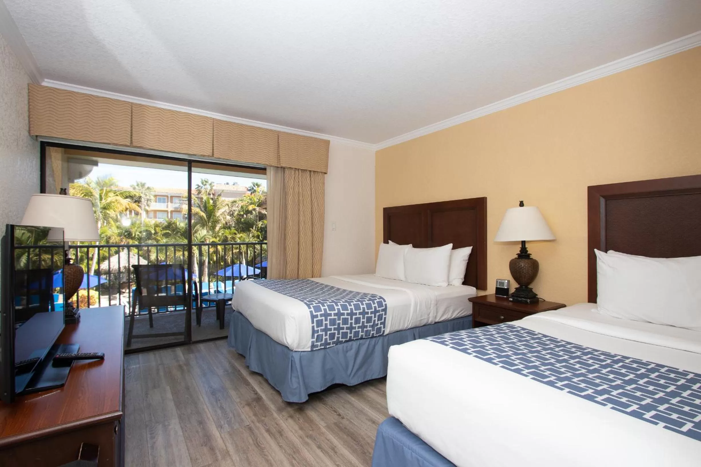 Bed in Coconut Cove All Suite Hotel