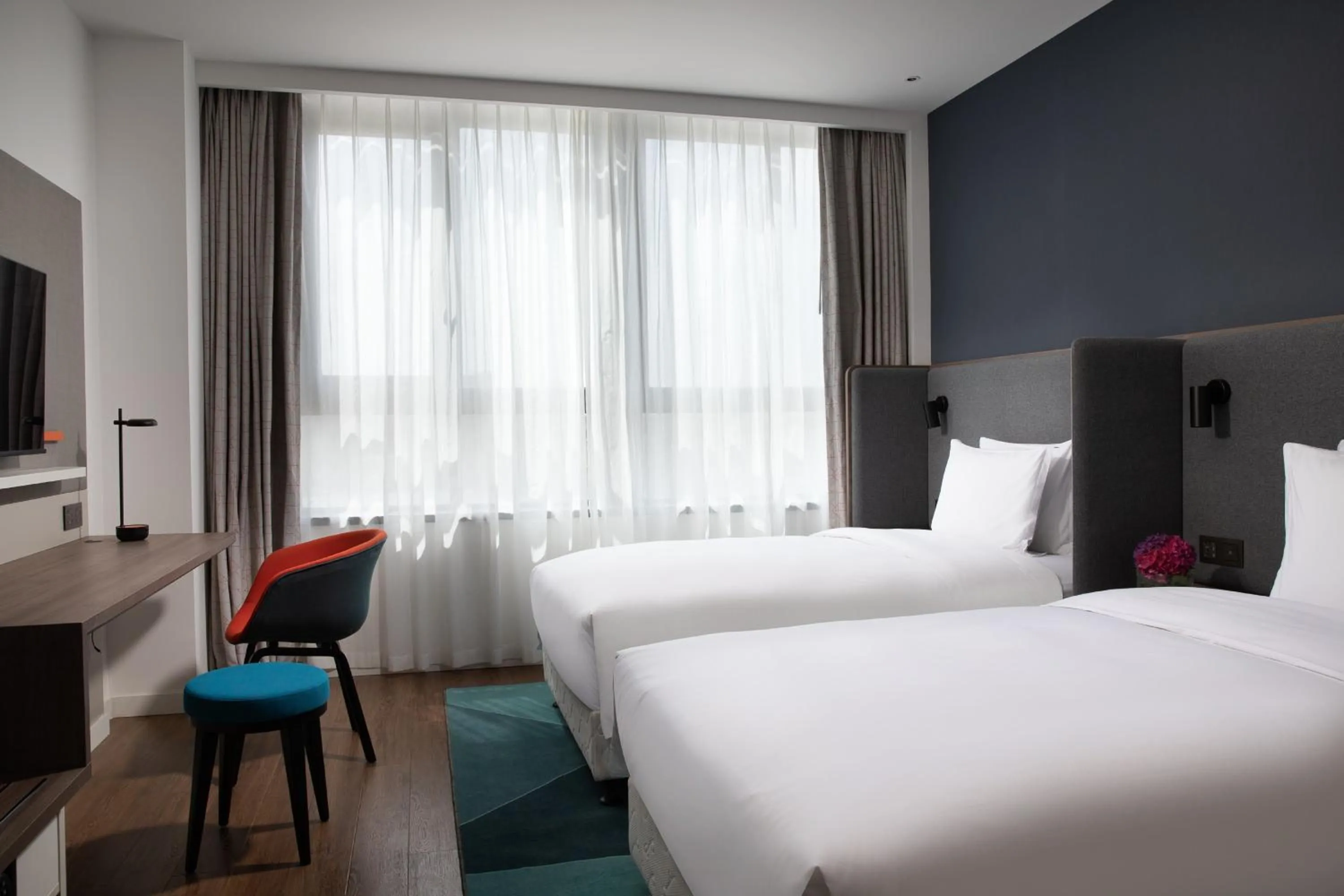 Photo of the whole room, Bed in Holiday Inn Express Chengdu Longquanyi North by IHG