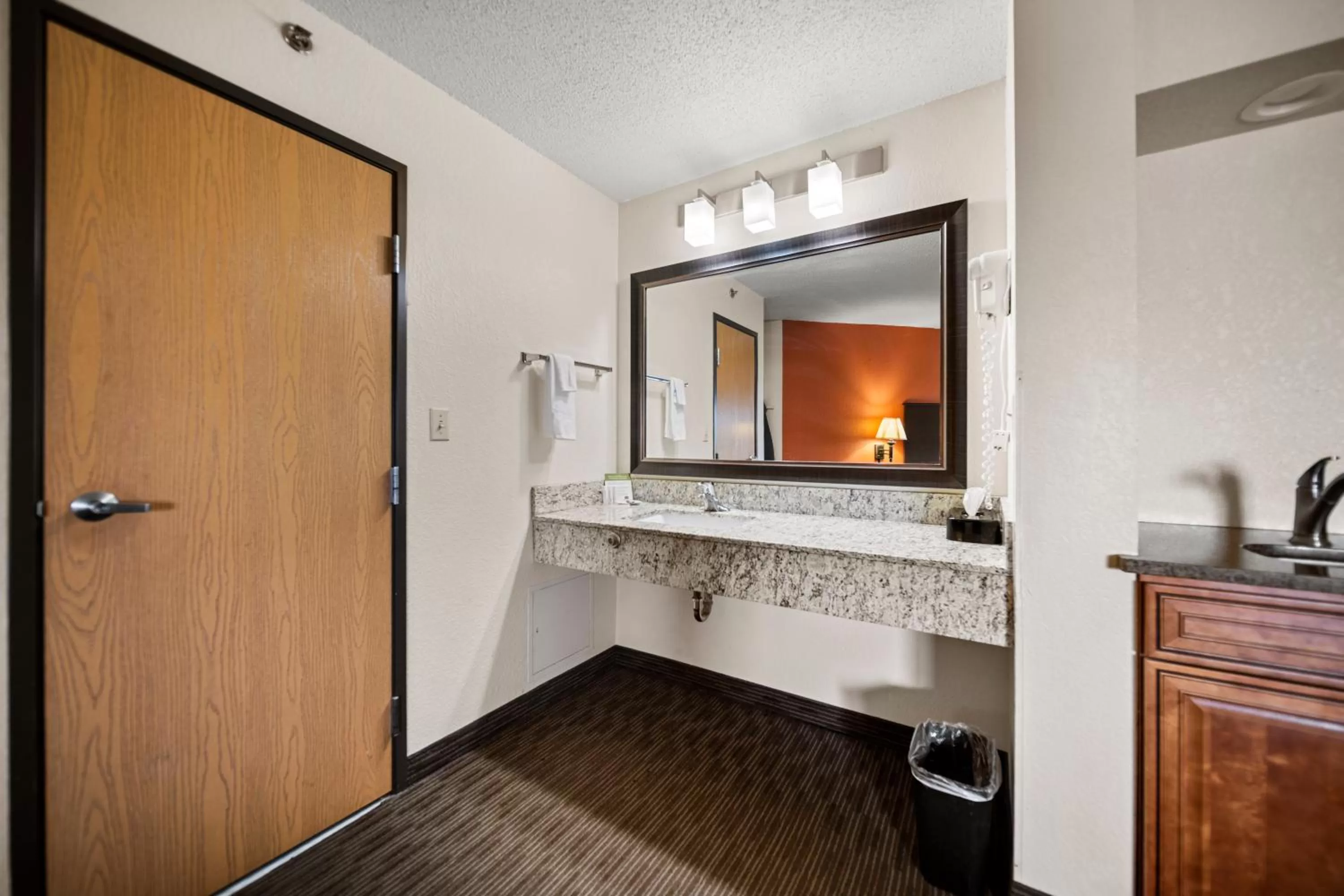 Bathroom in AmericInn by Wyndham Ames