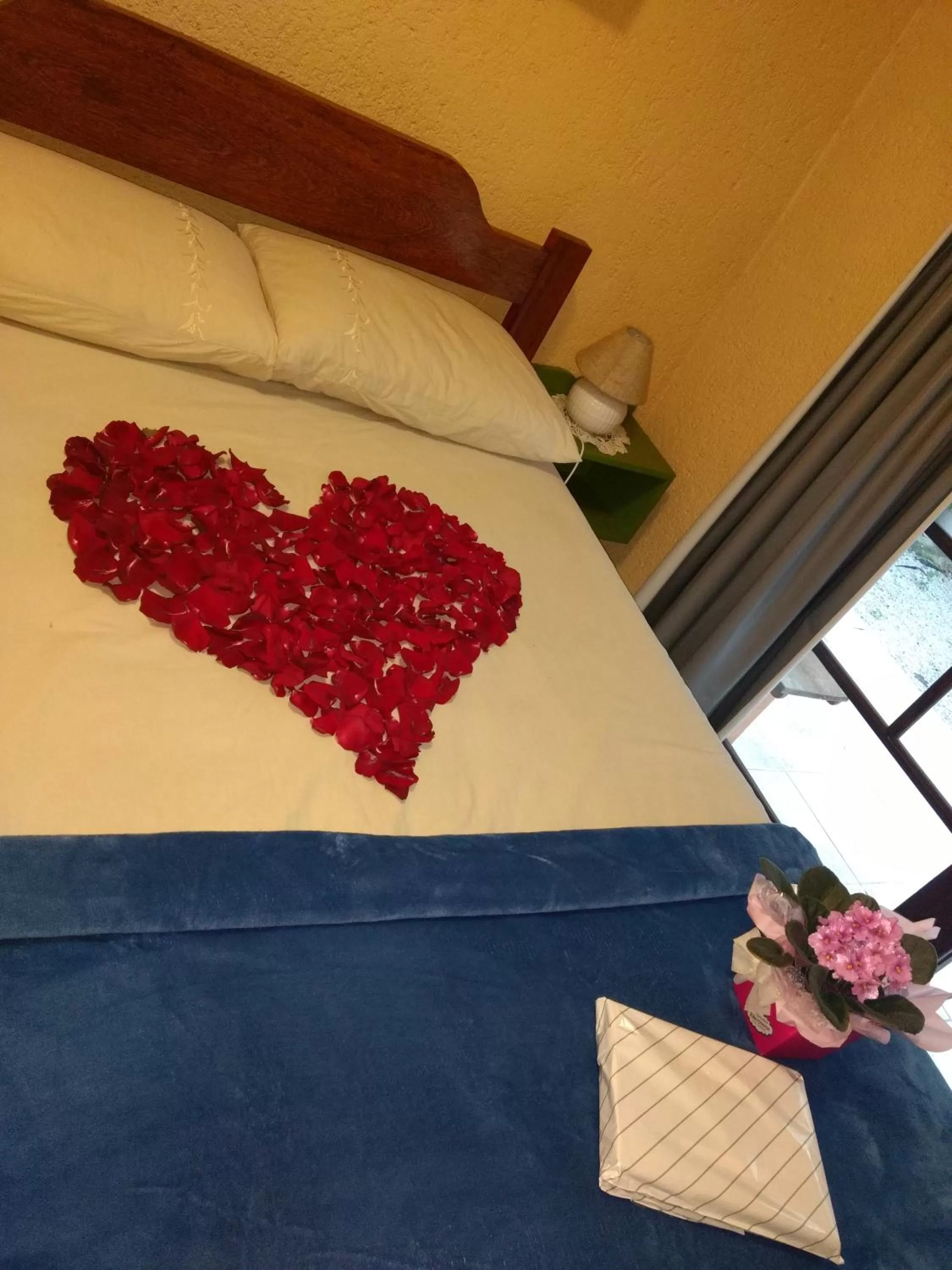 Bed in Pousada Santa Genoveva campeche