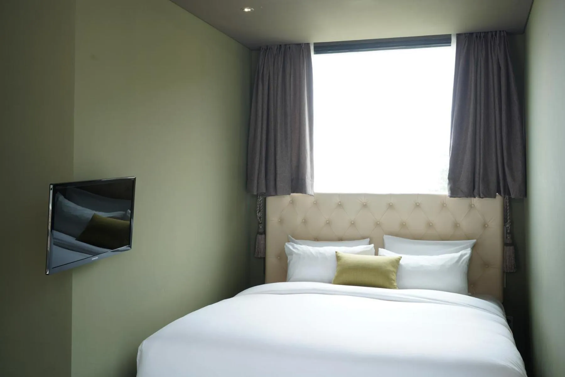 Bed in Jeju Hotel Scarboro