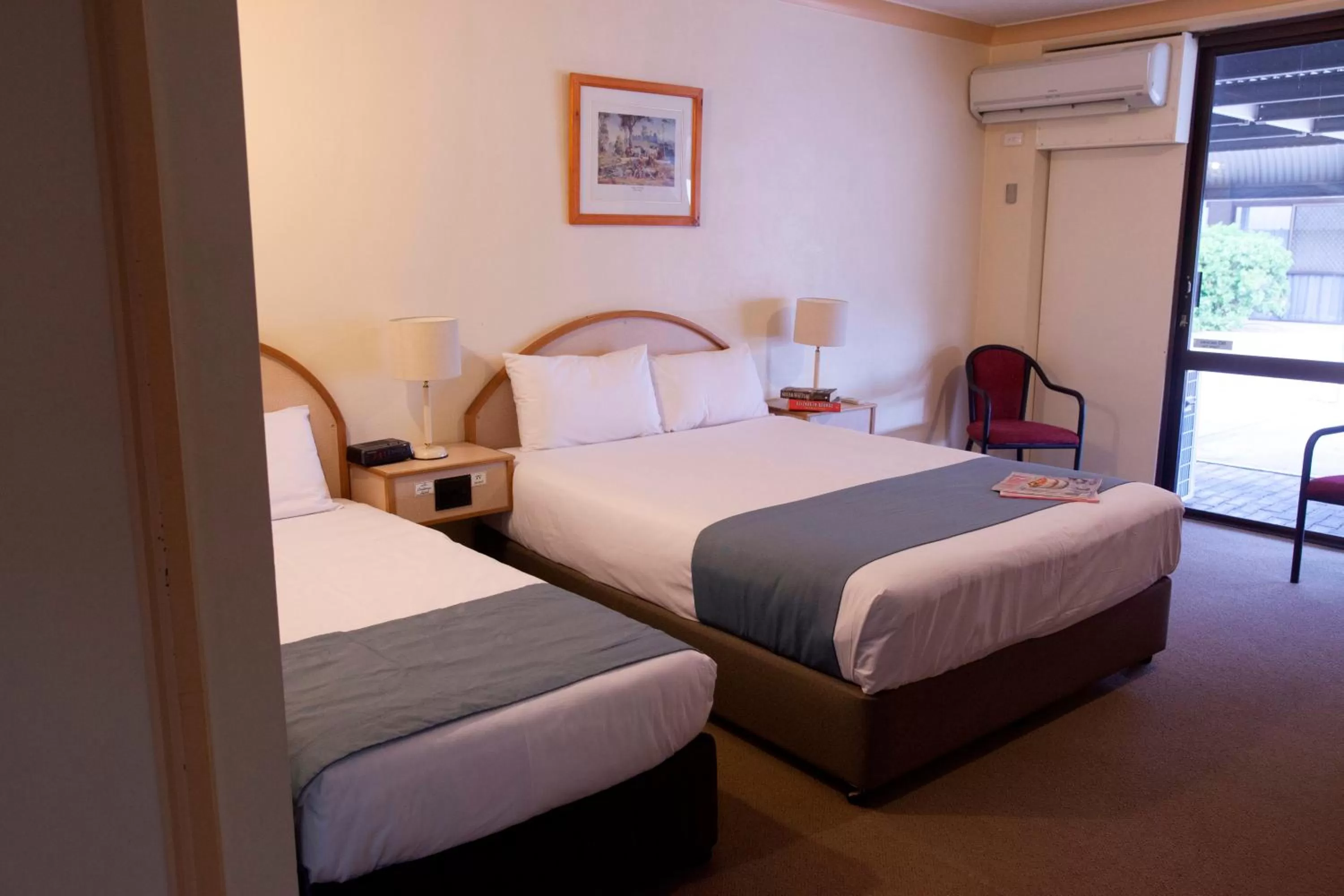 Bed in Longreach Motor Inn