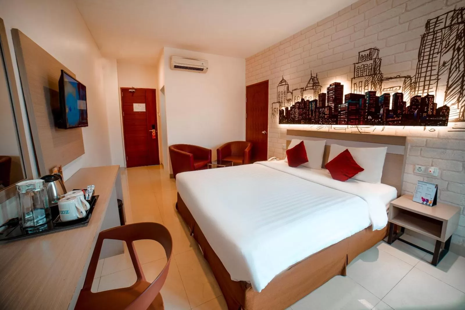 Bed in Zoom Hotel Mulawarman