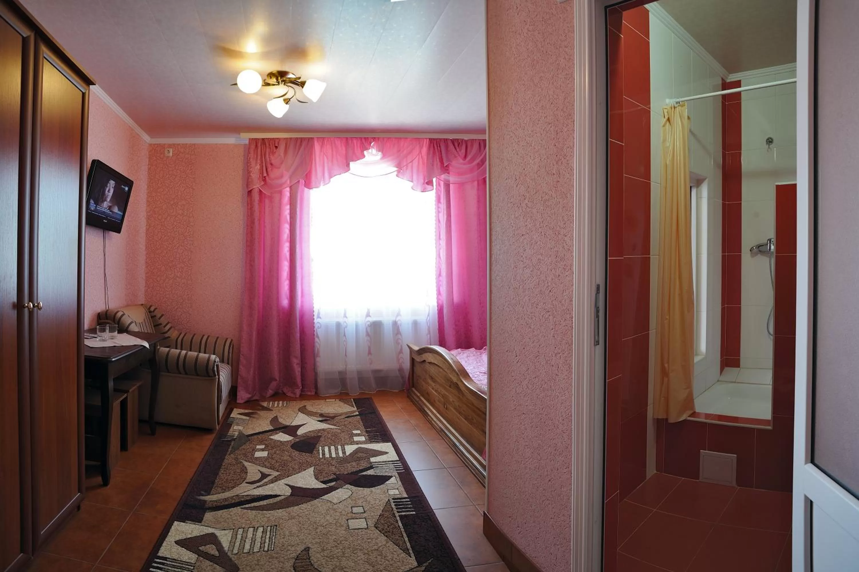 Bed in Monte-Kristo Hotel