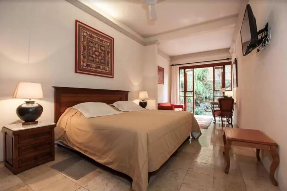 Bed in Orchidelirium Casa Hotel & Salud Estética