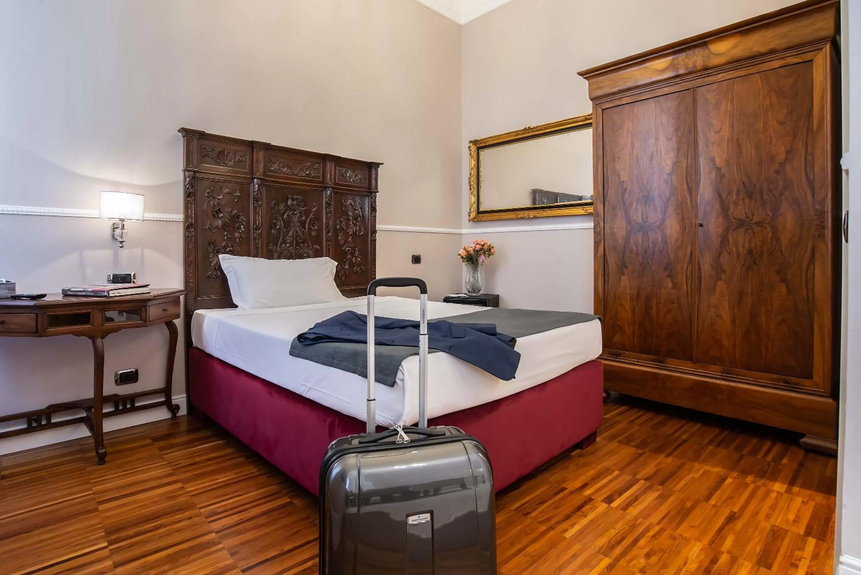 Bed in I TRE MOSCHETTIERI - D'ARTAGNAN Luxury Guest House