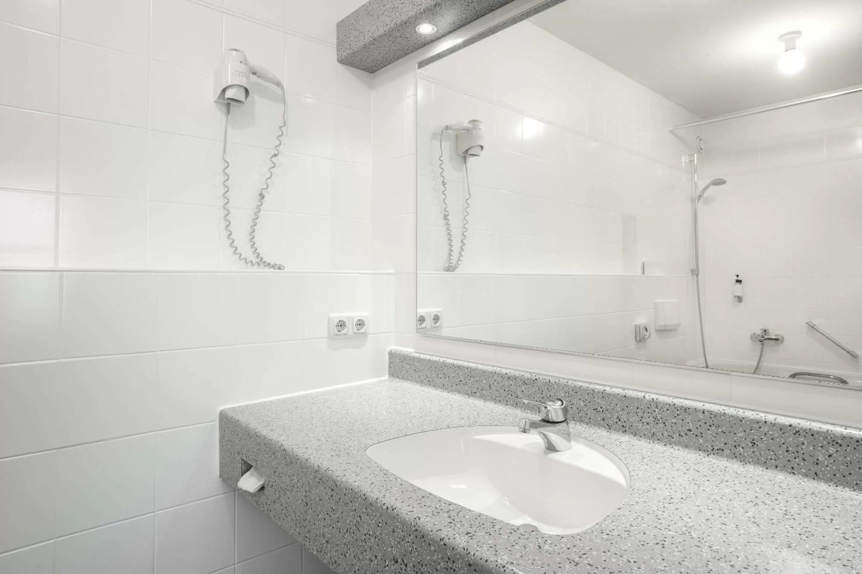 Bathroom in Styles Hotel Unterföhring