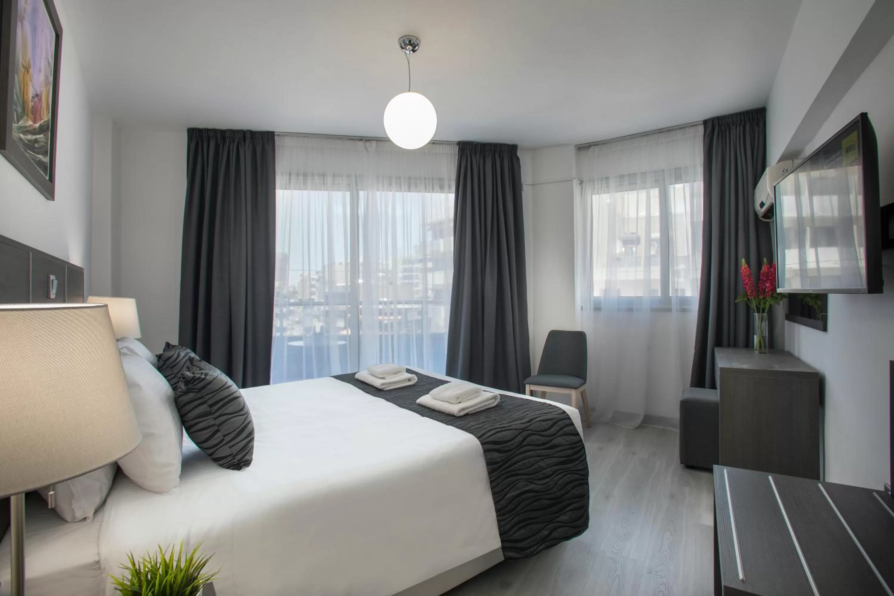 Bed in Blazer Residence