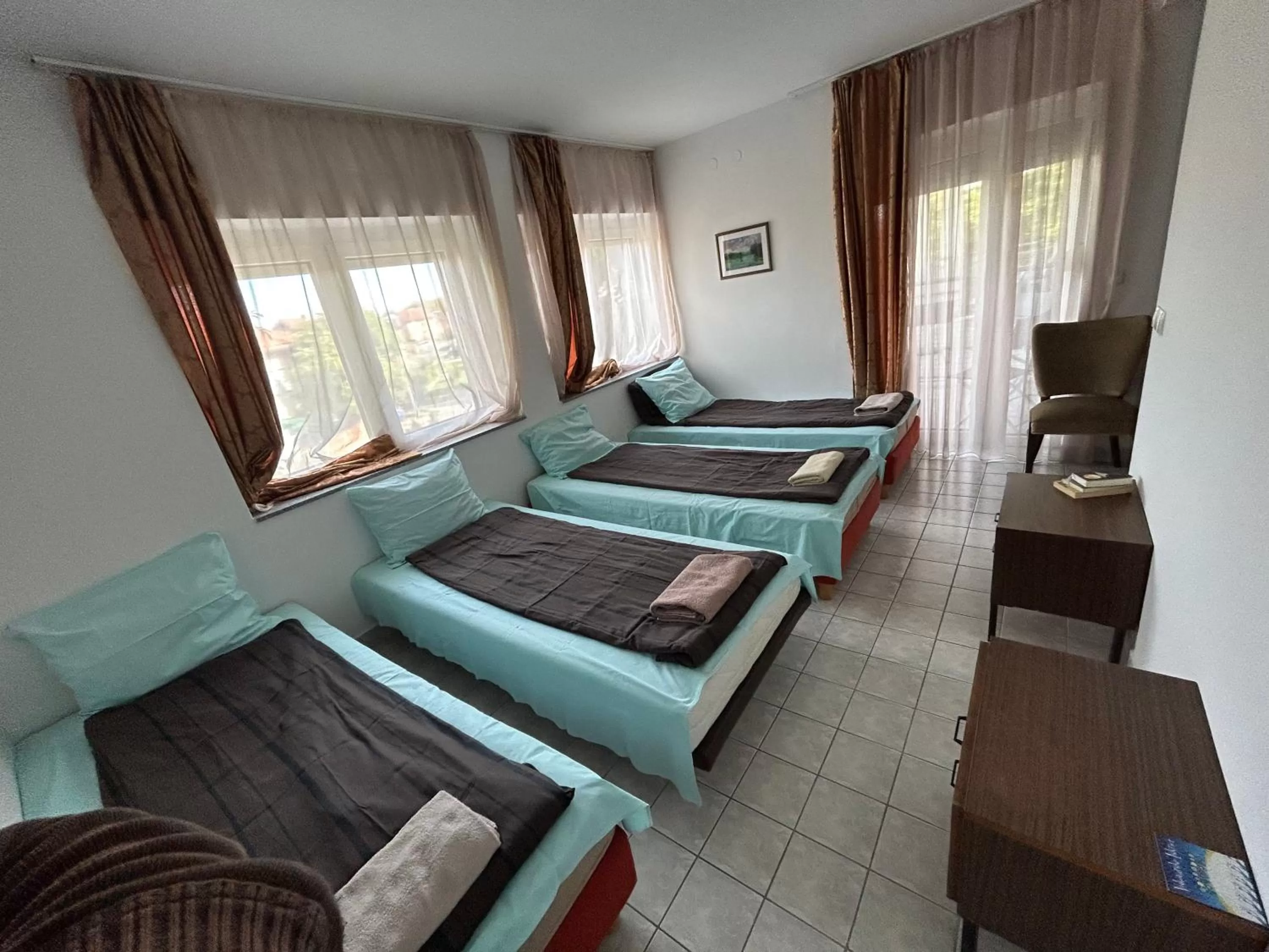 Bed, Seating Area in Pansion Vila Vanda