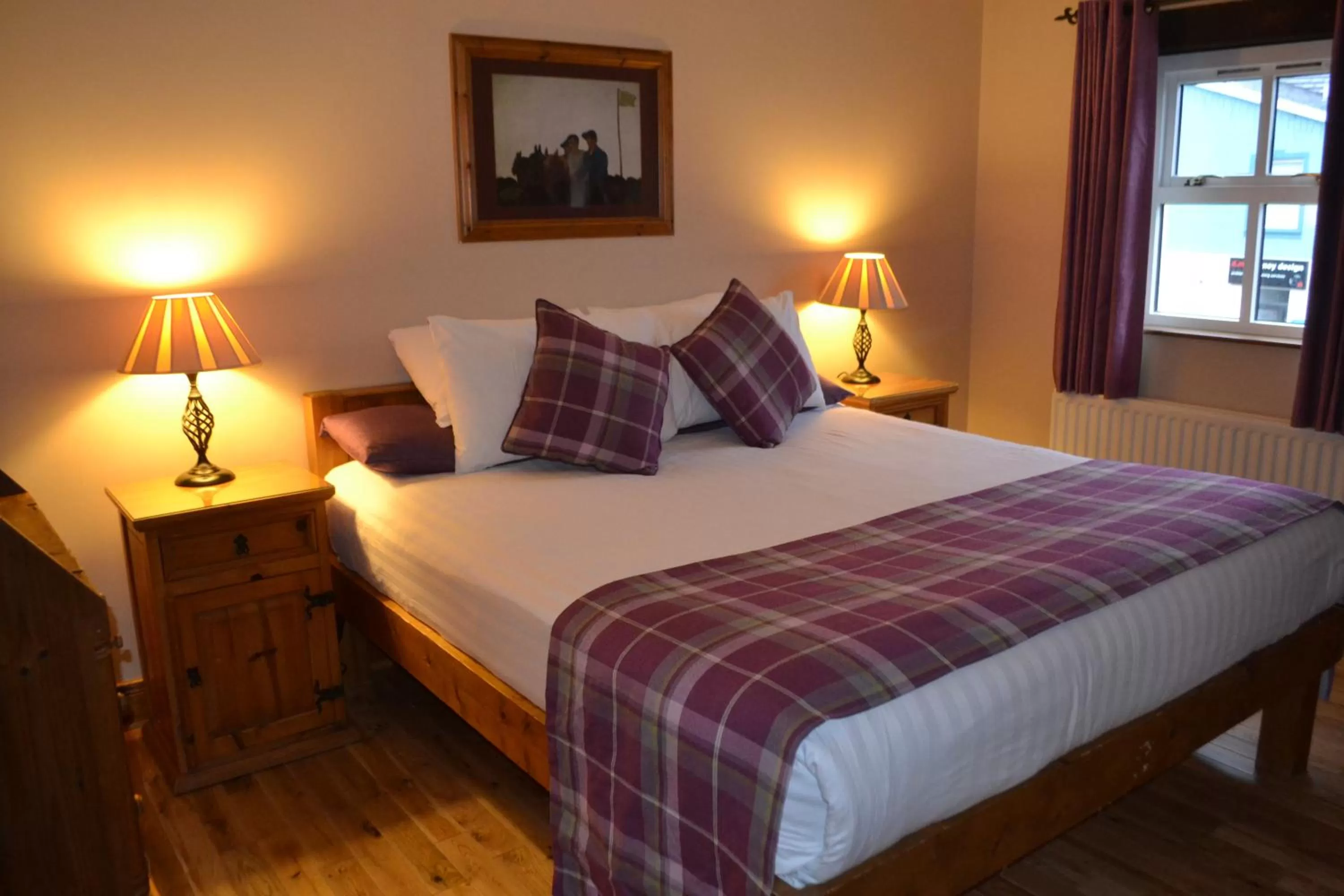 Bed in Walsh's Hotel and Apartments