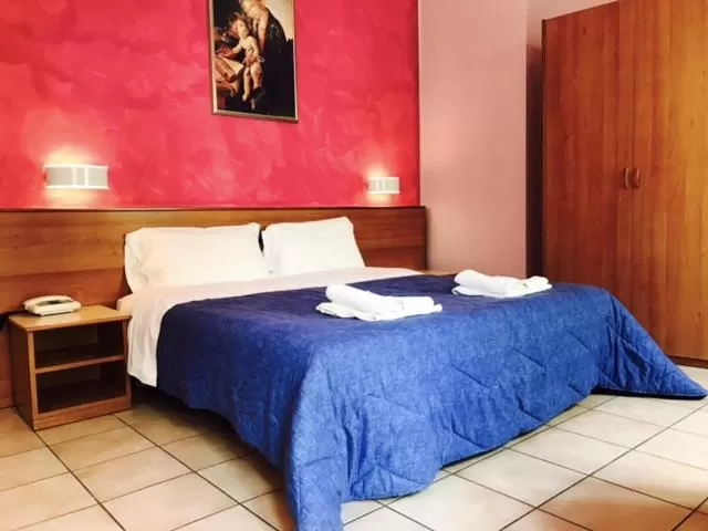 Bed in Hotel Pellegrino E Pace