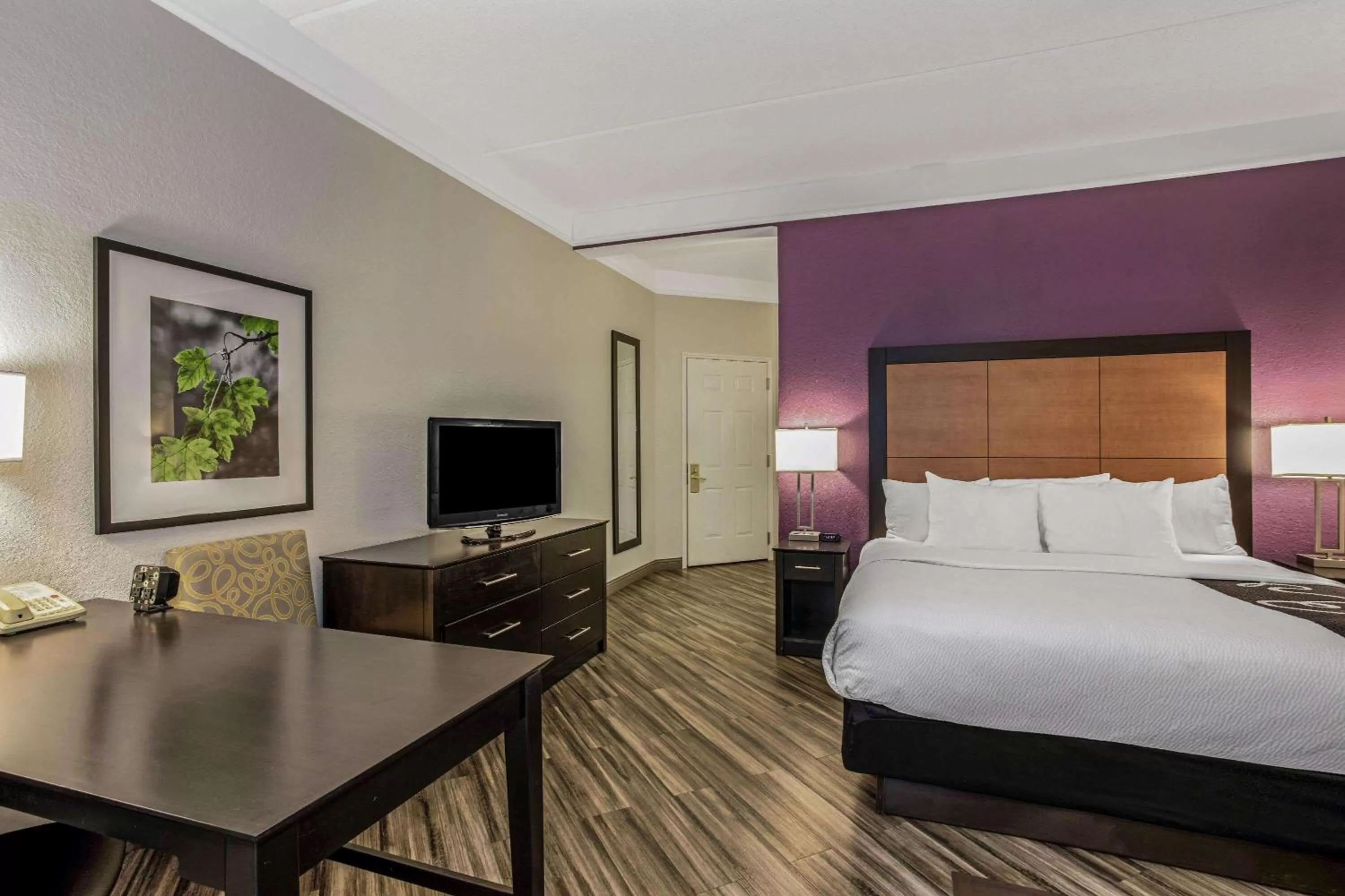 Photo of the whole room, Bed in La Quinta by Wyndham Orlando Airport North - Free Airport Shuttle!