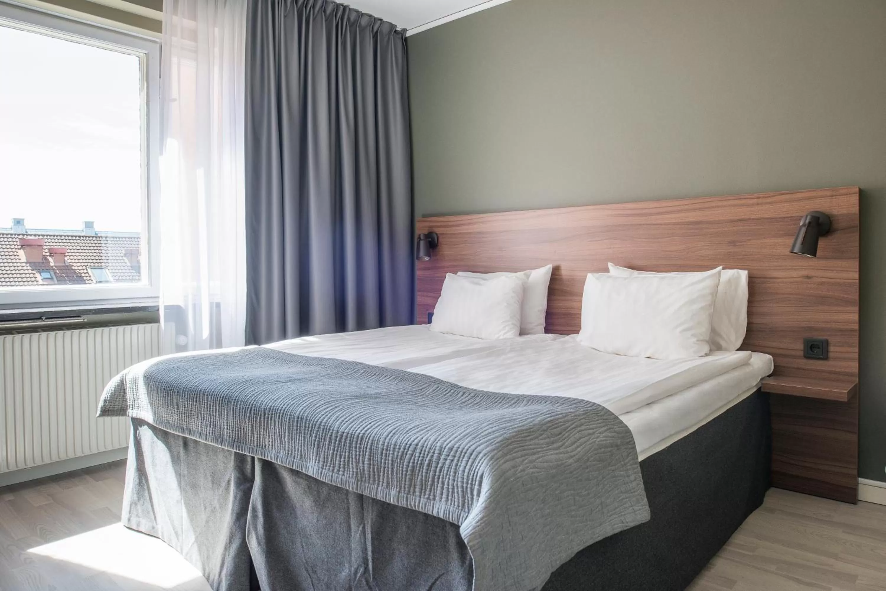 Bedroom, Bed in ProfilHotels Grand Kristianstad
