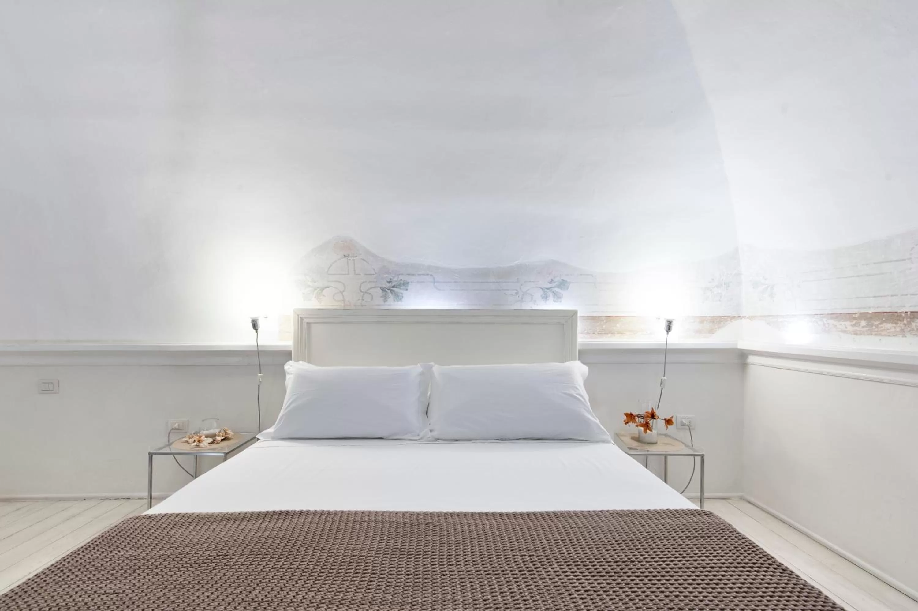 Bed in Casa di Lo Suites