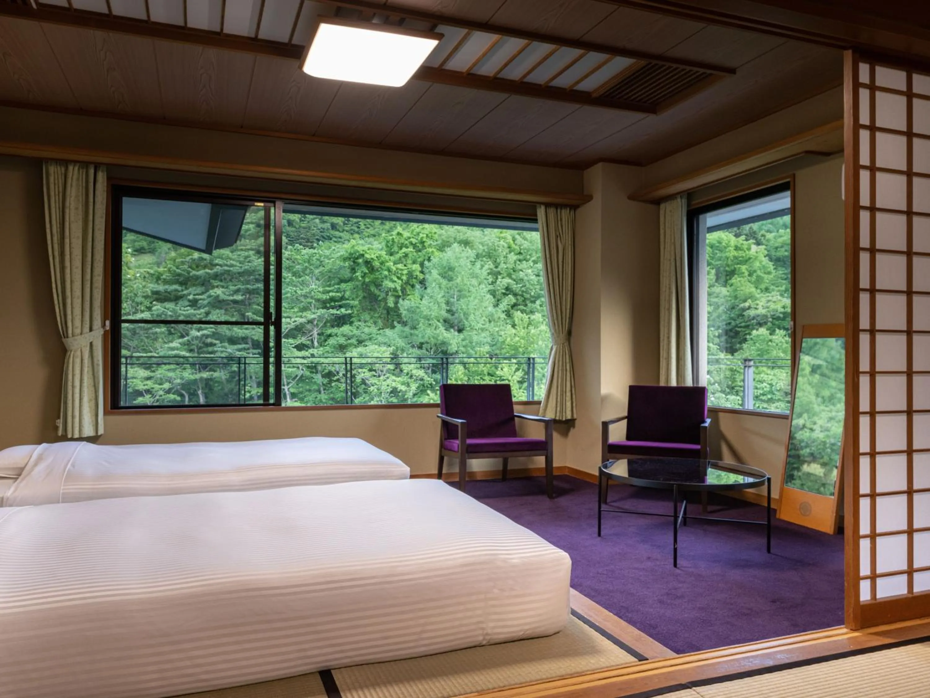 Photo of the whole room, Bed in KAMENOI HOTEL Nikko Yunishigawa All-Inclusive Resort