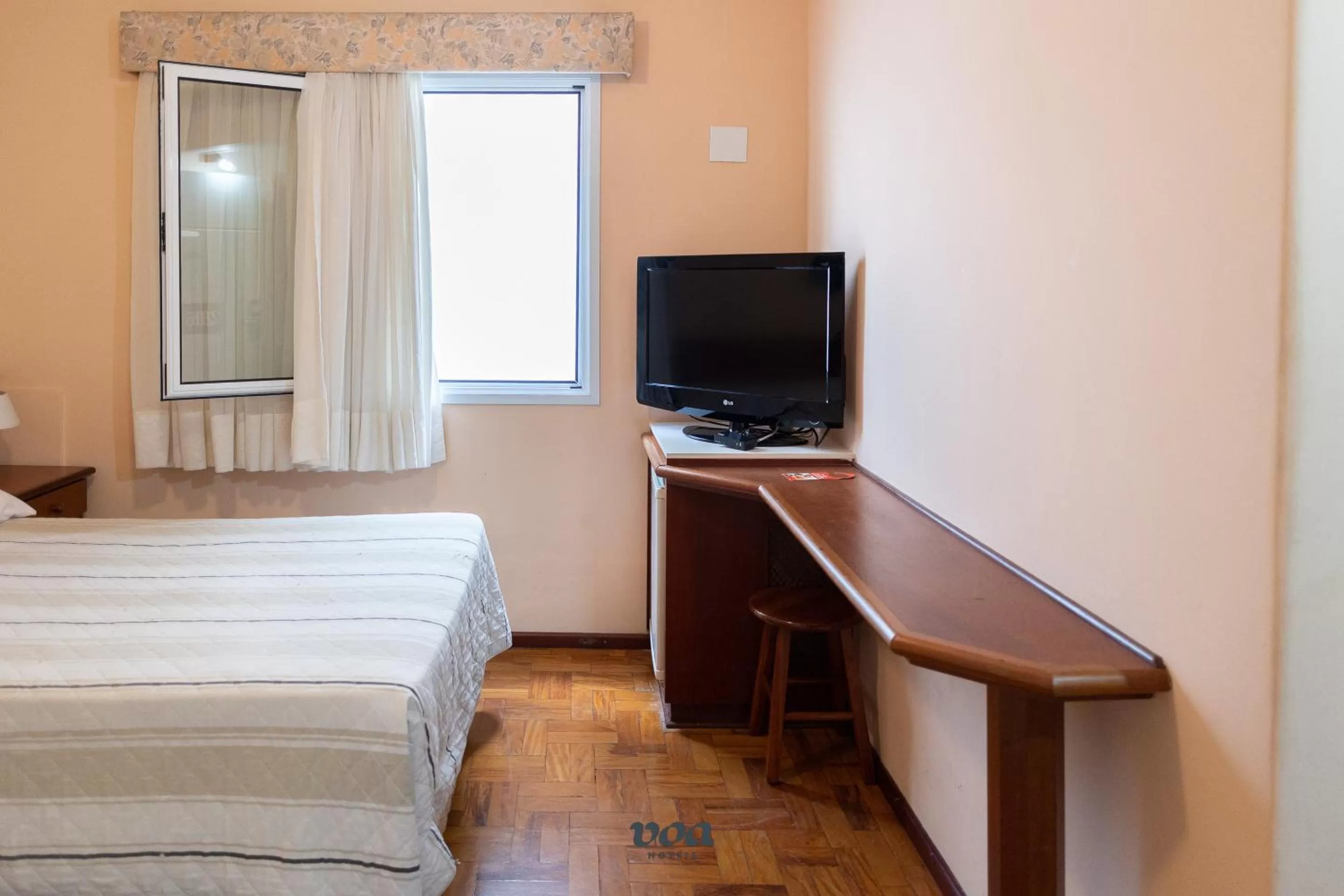 Bed in VOA Plazza Hotel